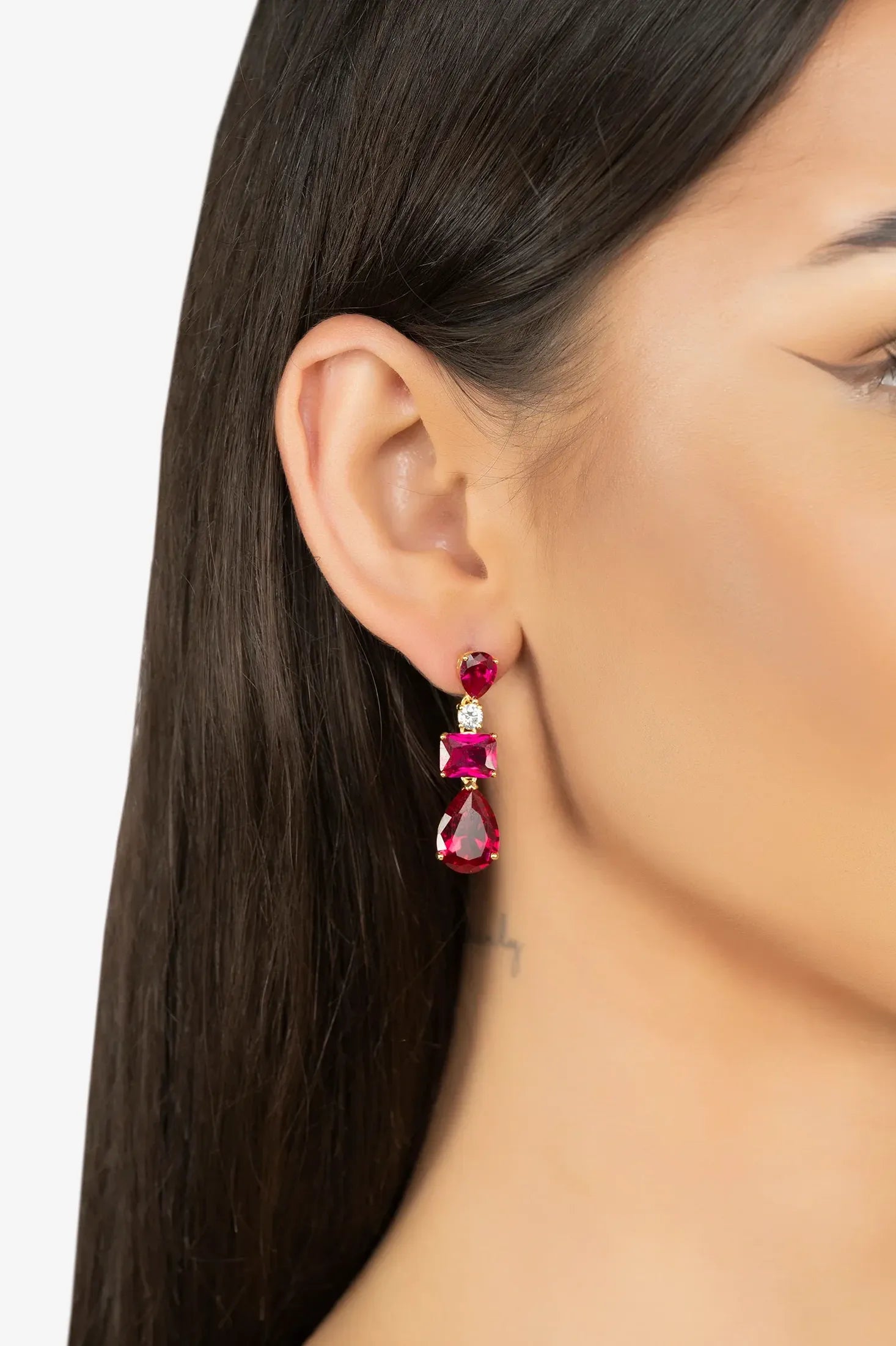 The earring worn by a model.