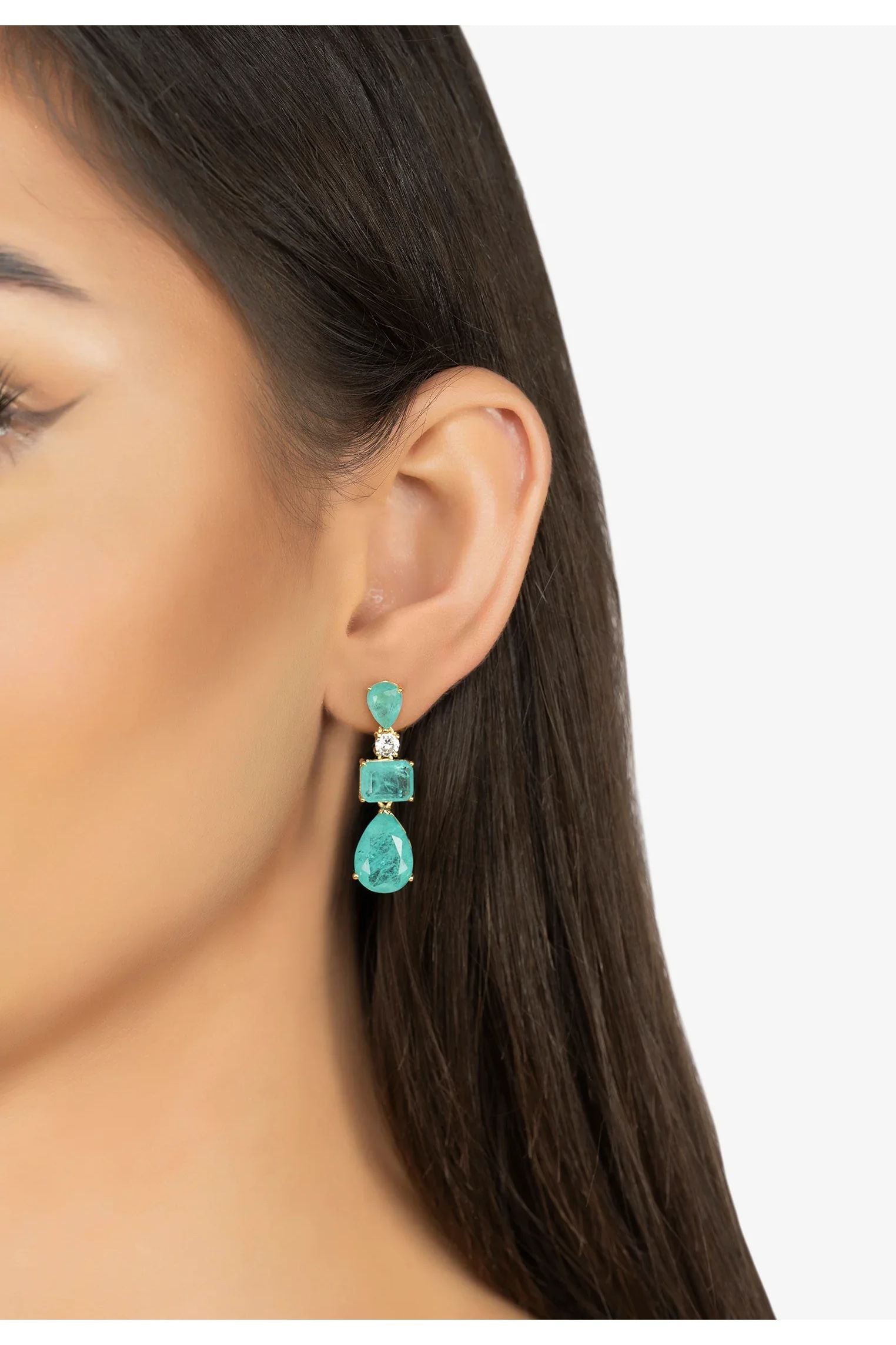 The earring worn by a model.