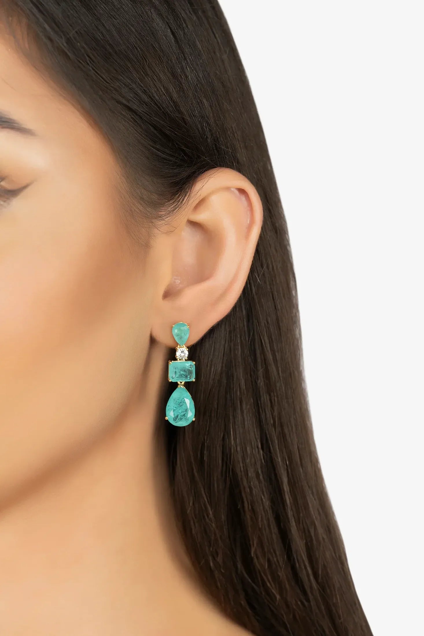 The earring worn by a model.