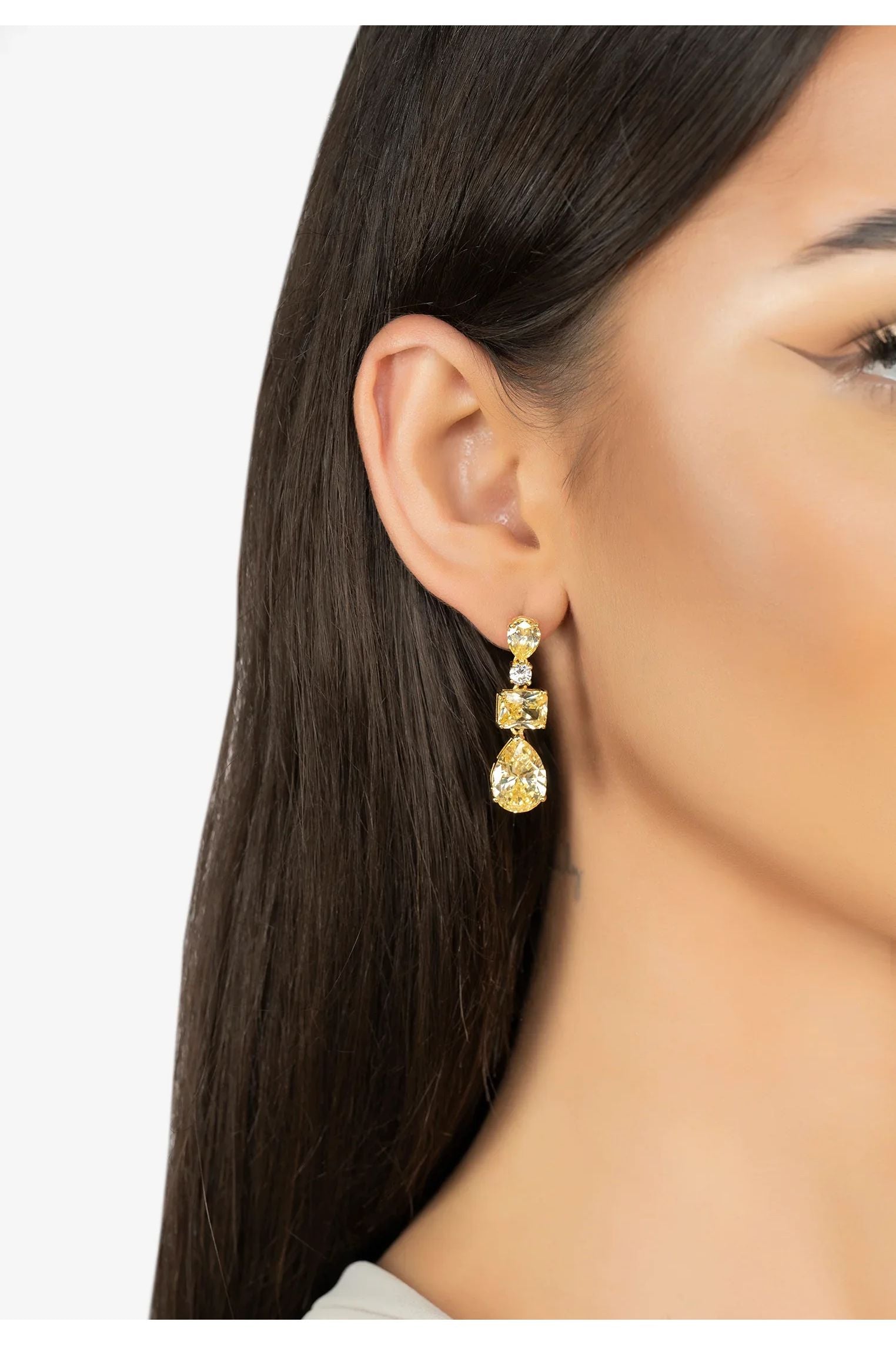 The earring worn by a model.