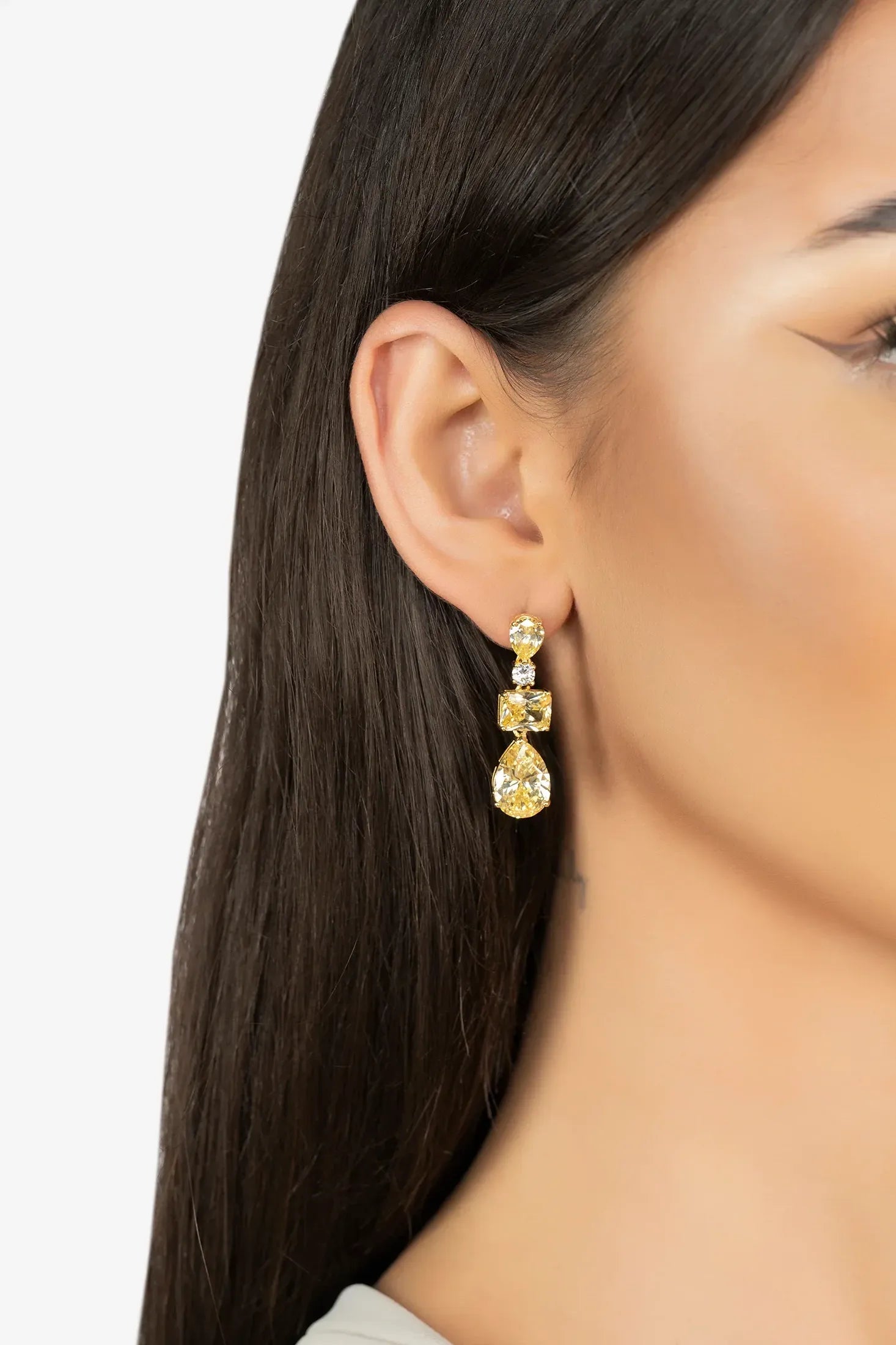 The earring worn by a model.