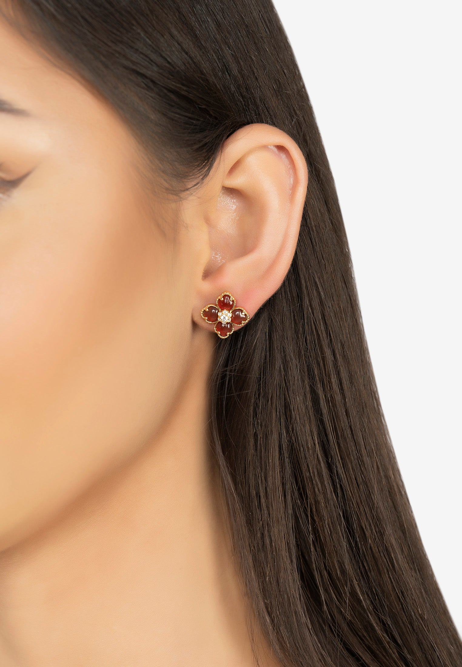 The earring worn by a model.