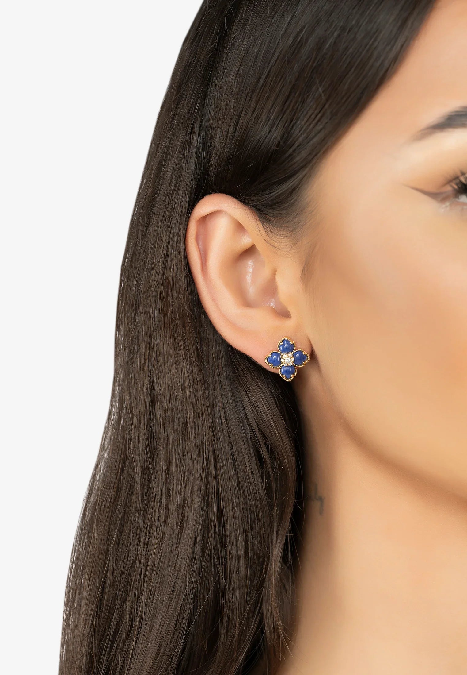 The earring worn by a model.