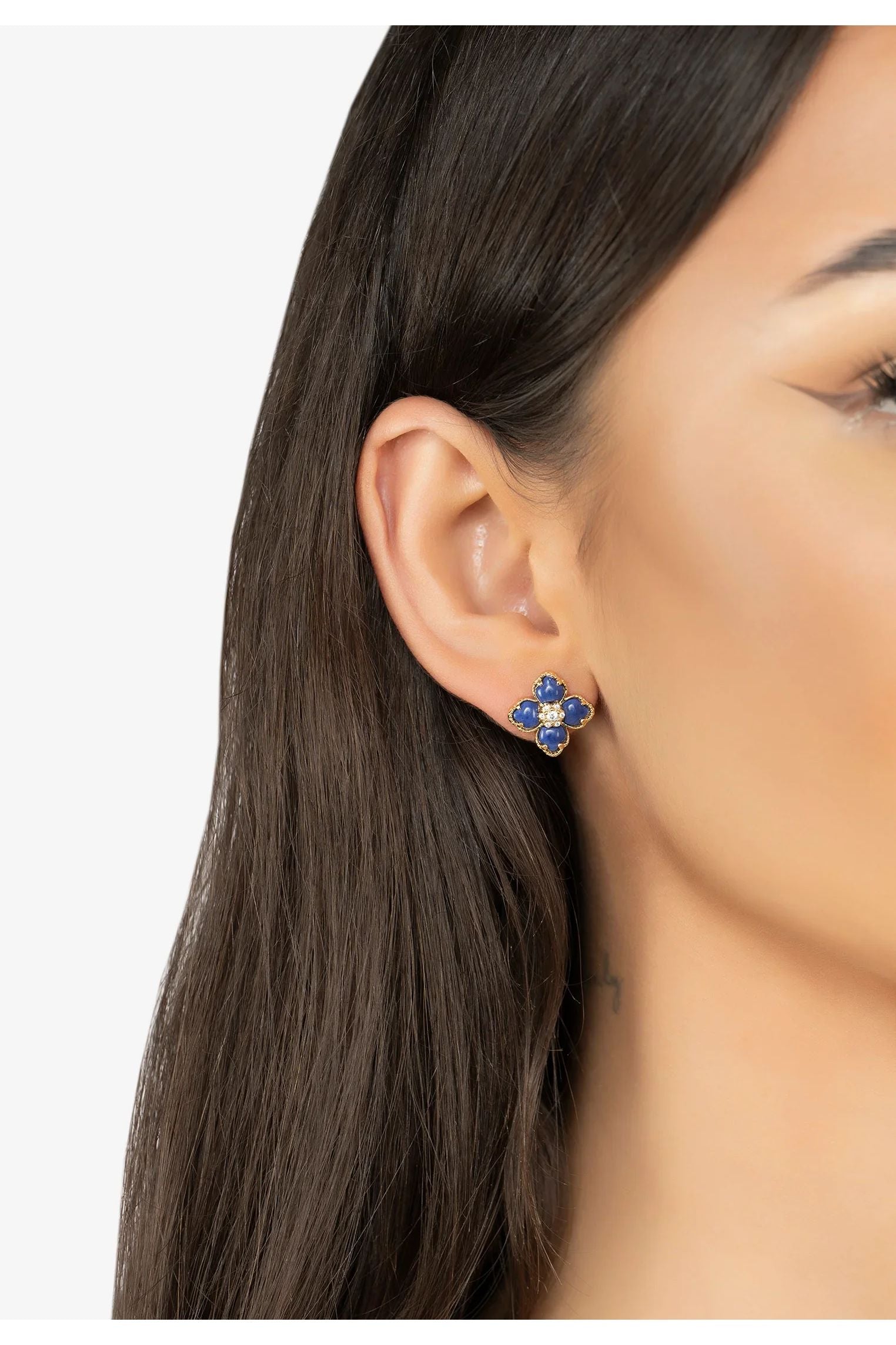 The earring worn by a model.