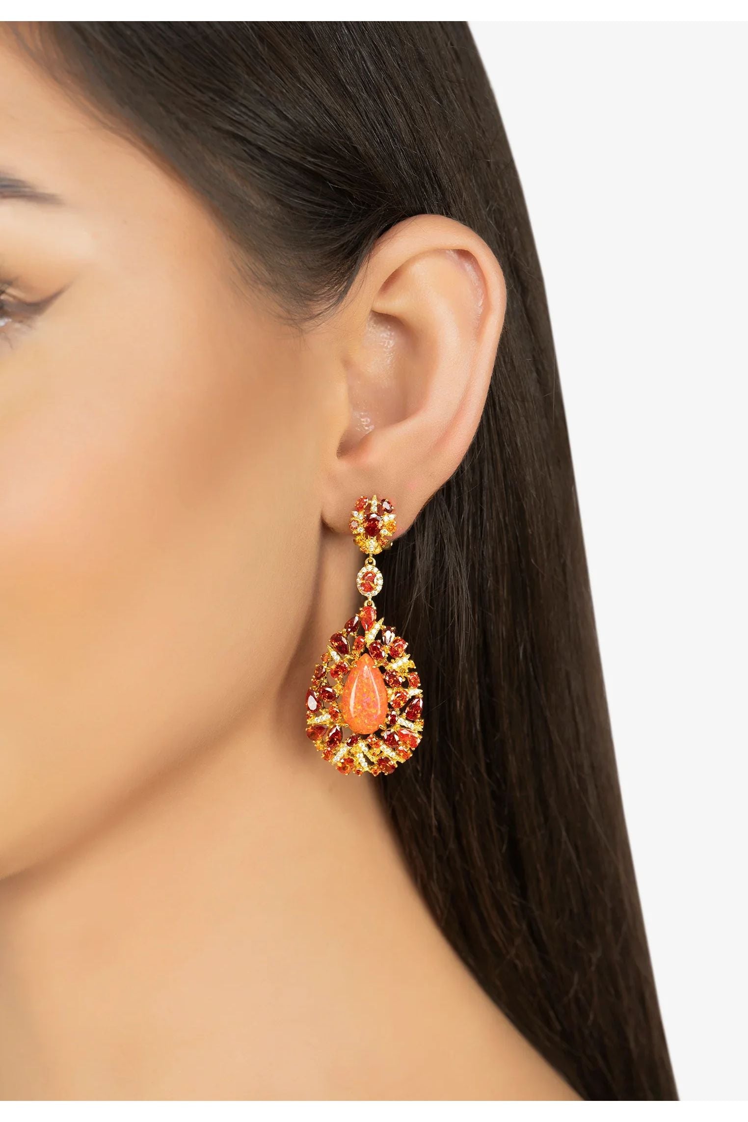 The earring worn by a model.
