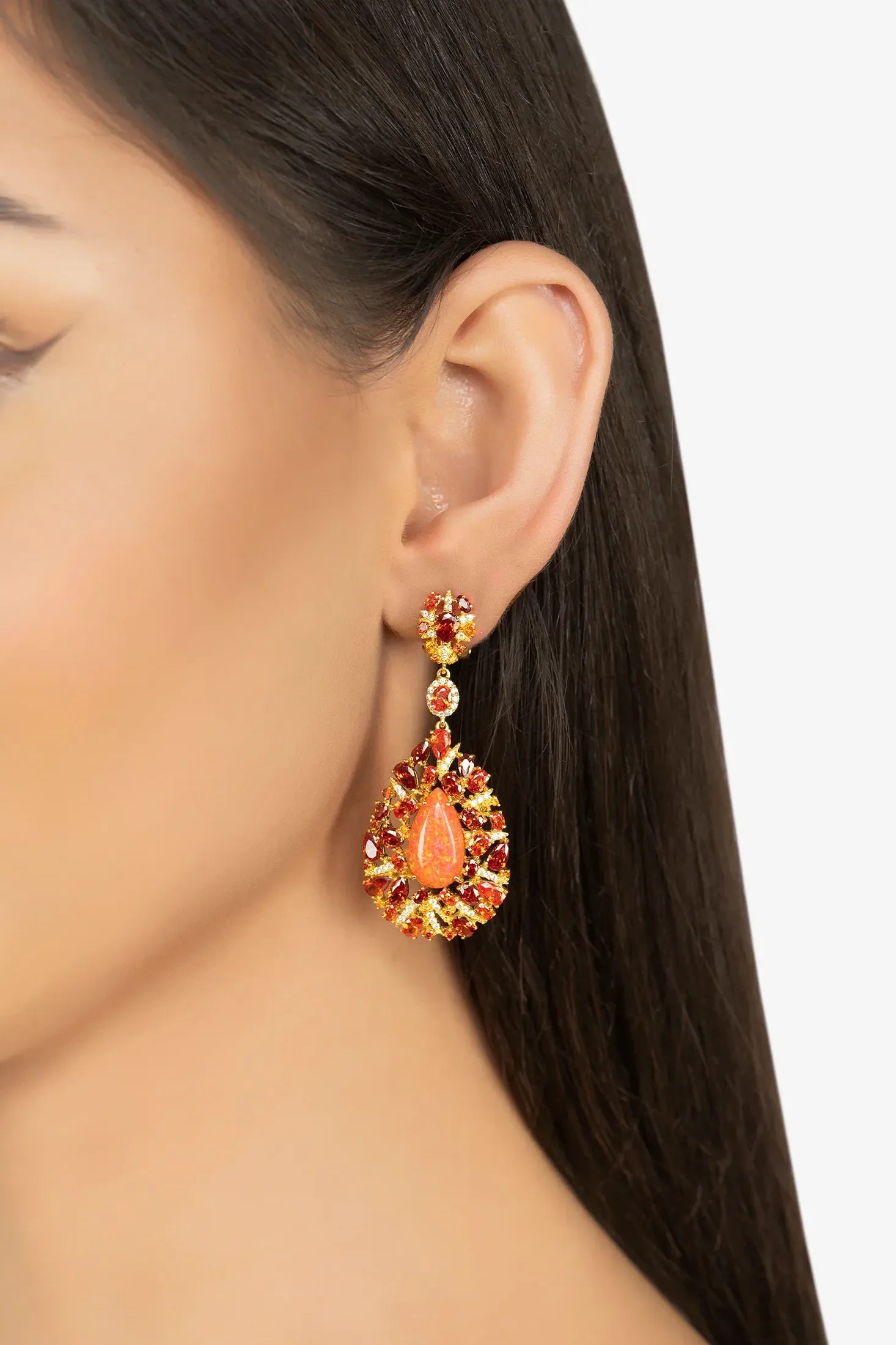 The earring worn by a model.
