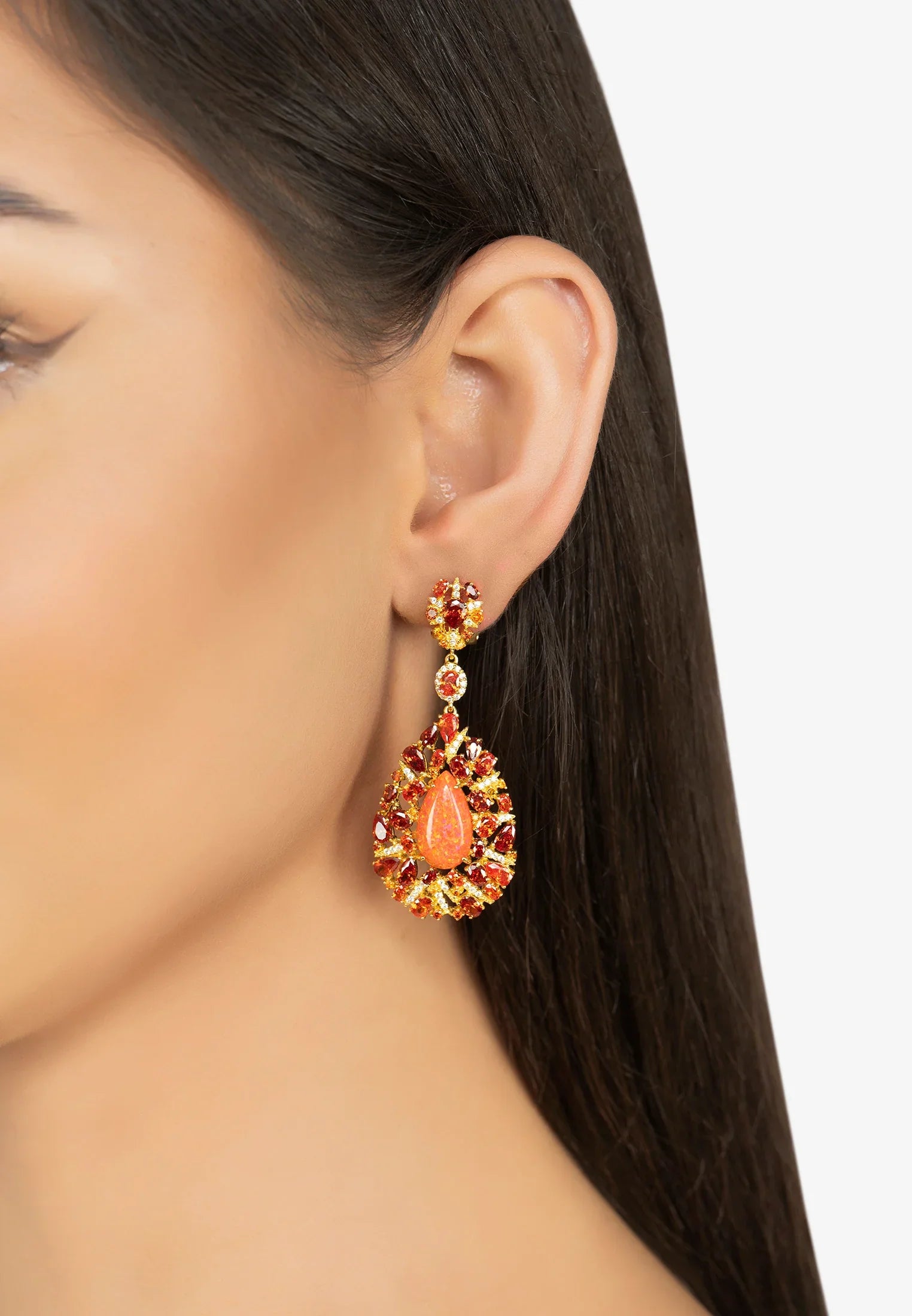 The earring worn by a model.