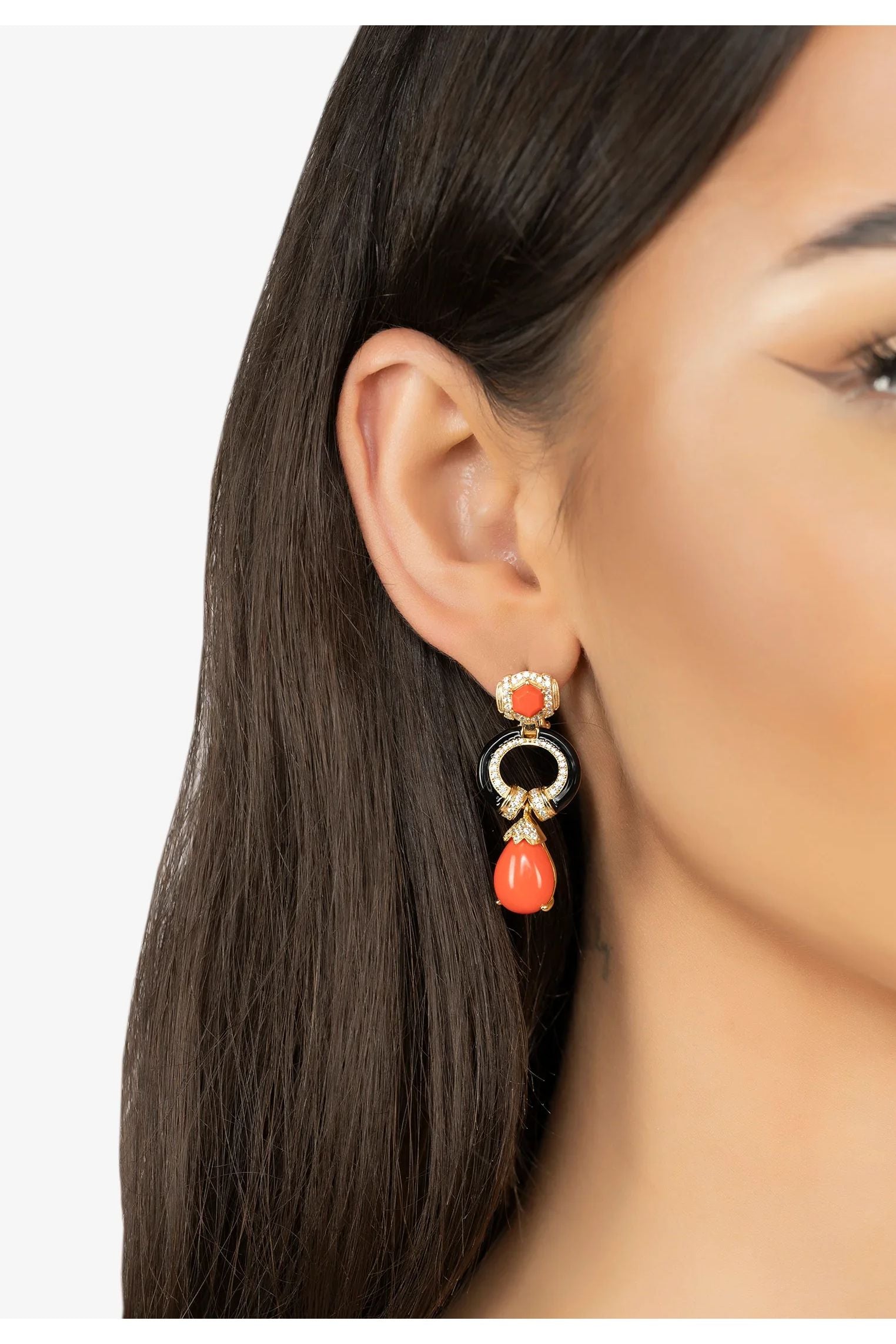 The earring worn by a model.