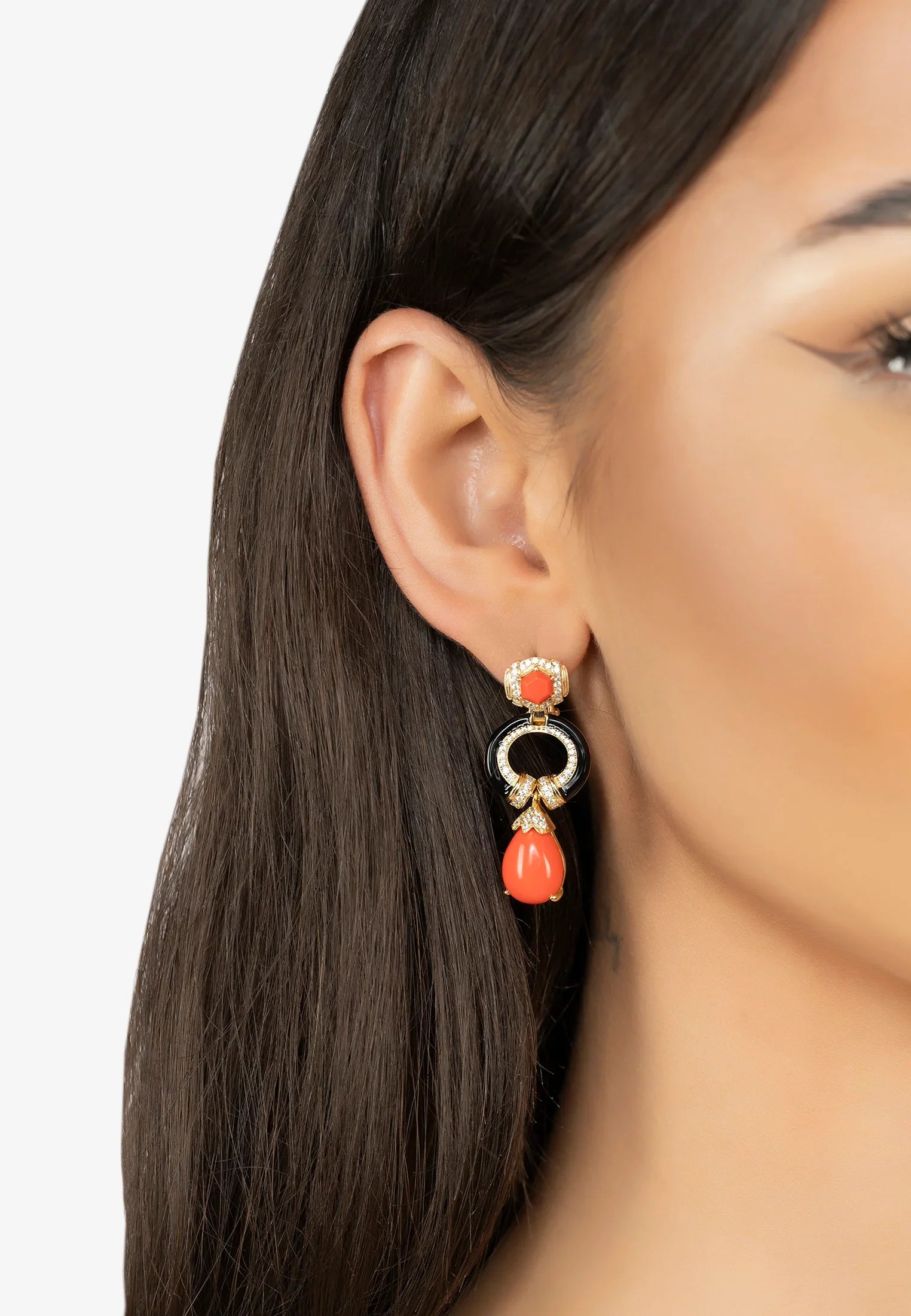 The earring worn by a model.
