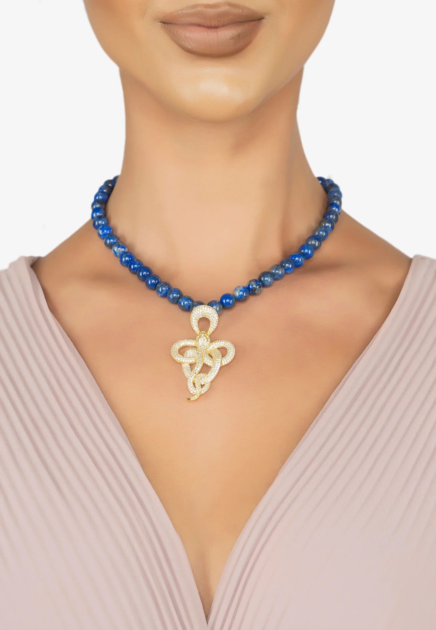 The necklace worn by a model.