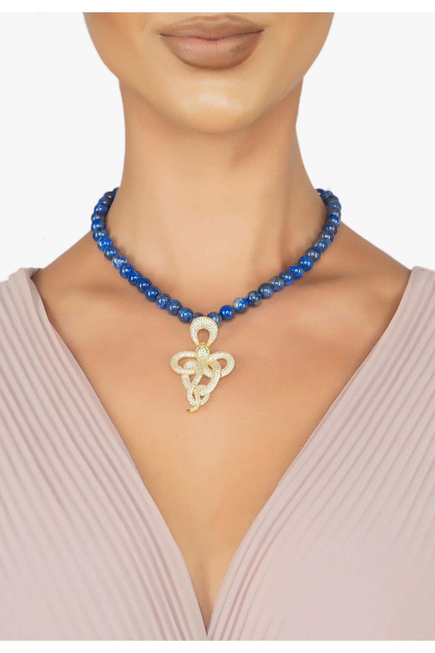 The necklace worn by a model.