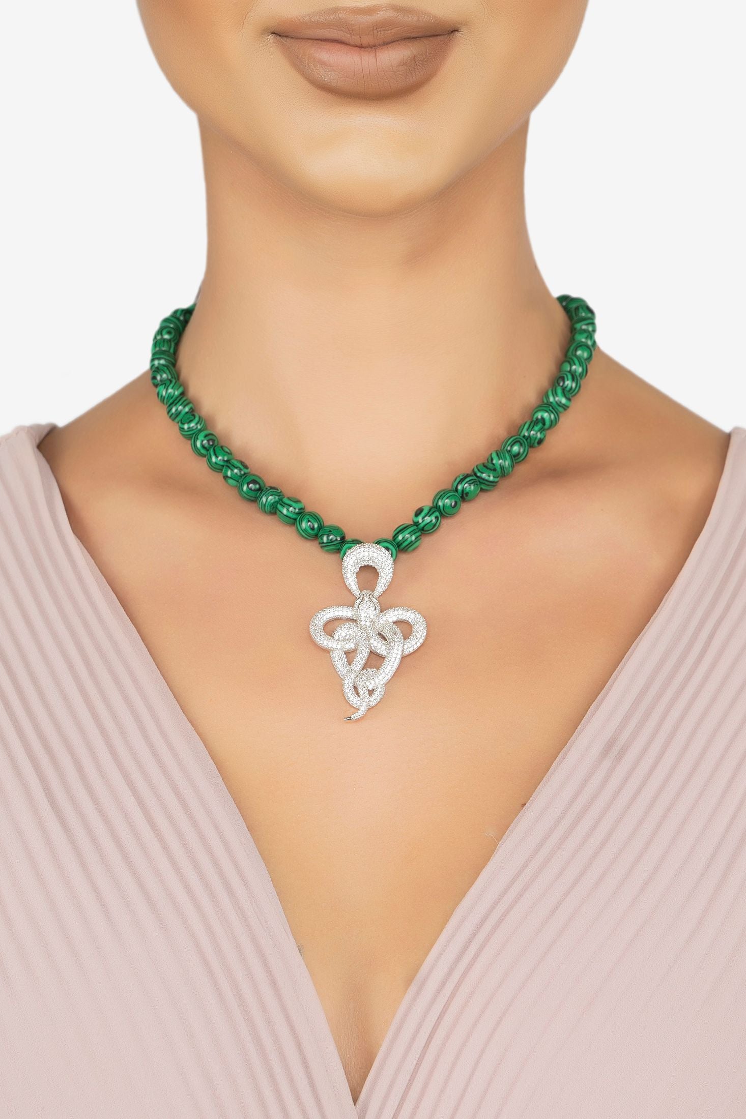 The necklace worn by a model.