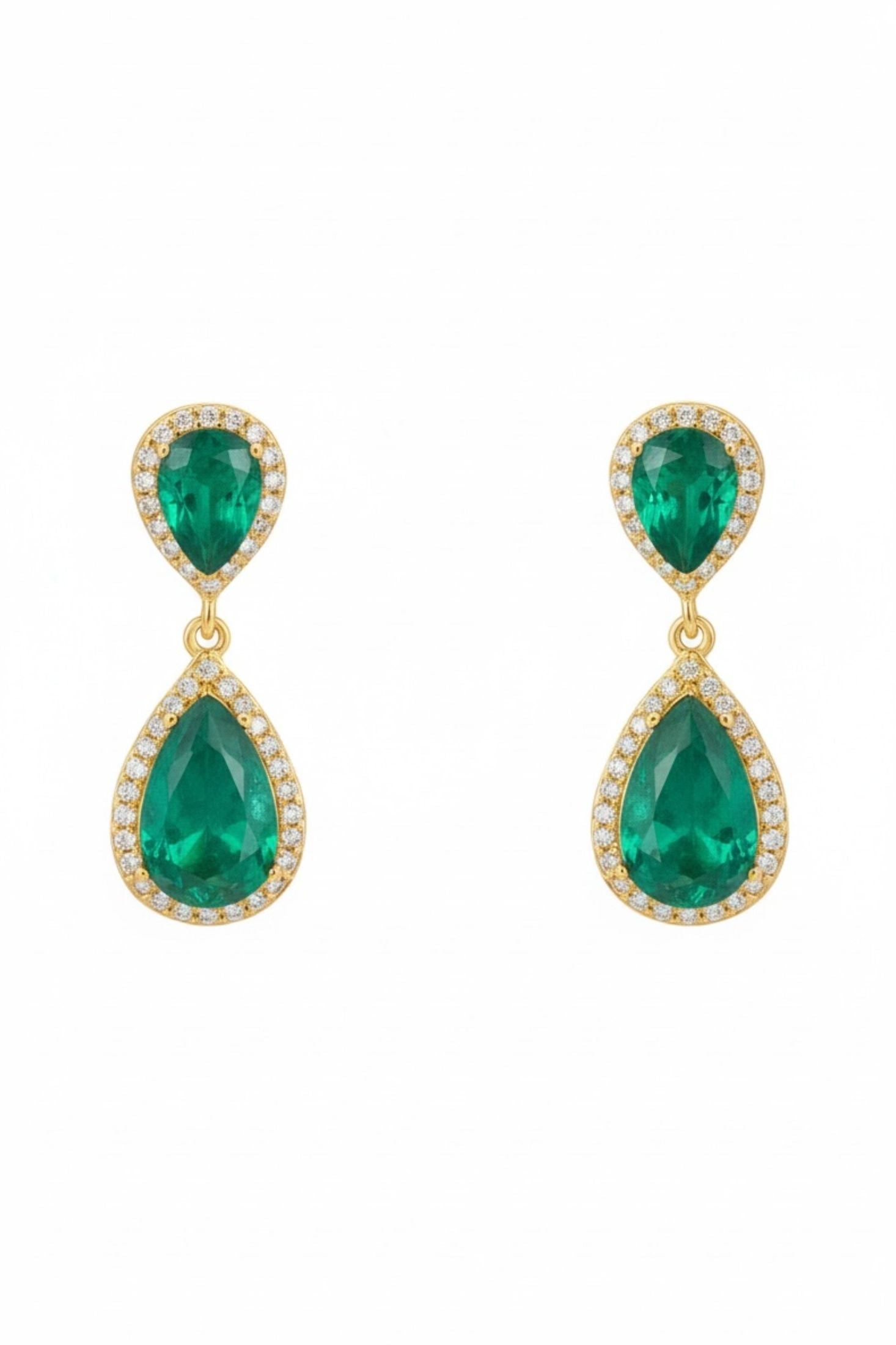 Pair of emerald green teardrop earrings with gold accents on a white background