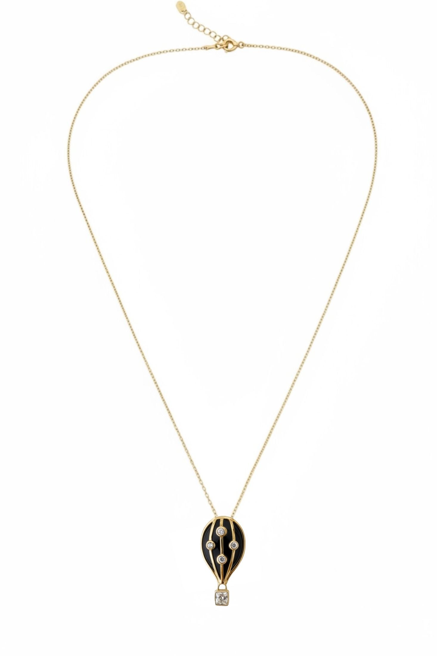 Gold hot air balloon pendant necklace on a white background