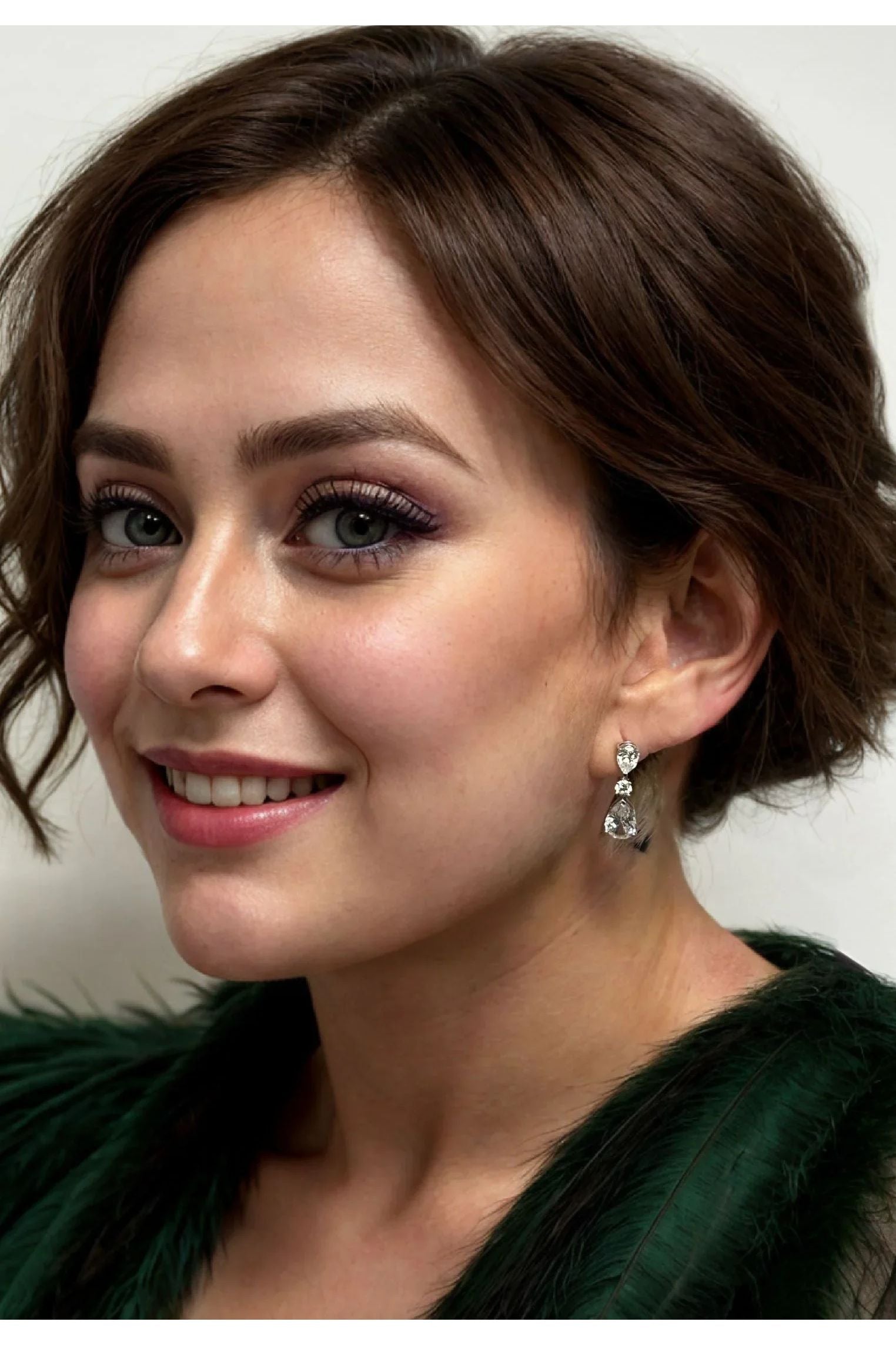 The earring worn by a model.