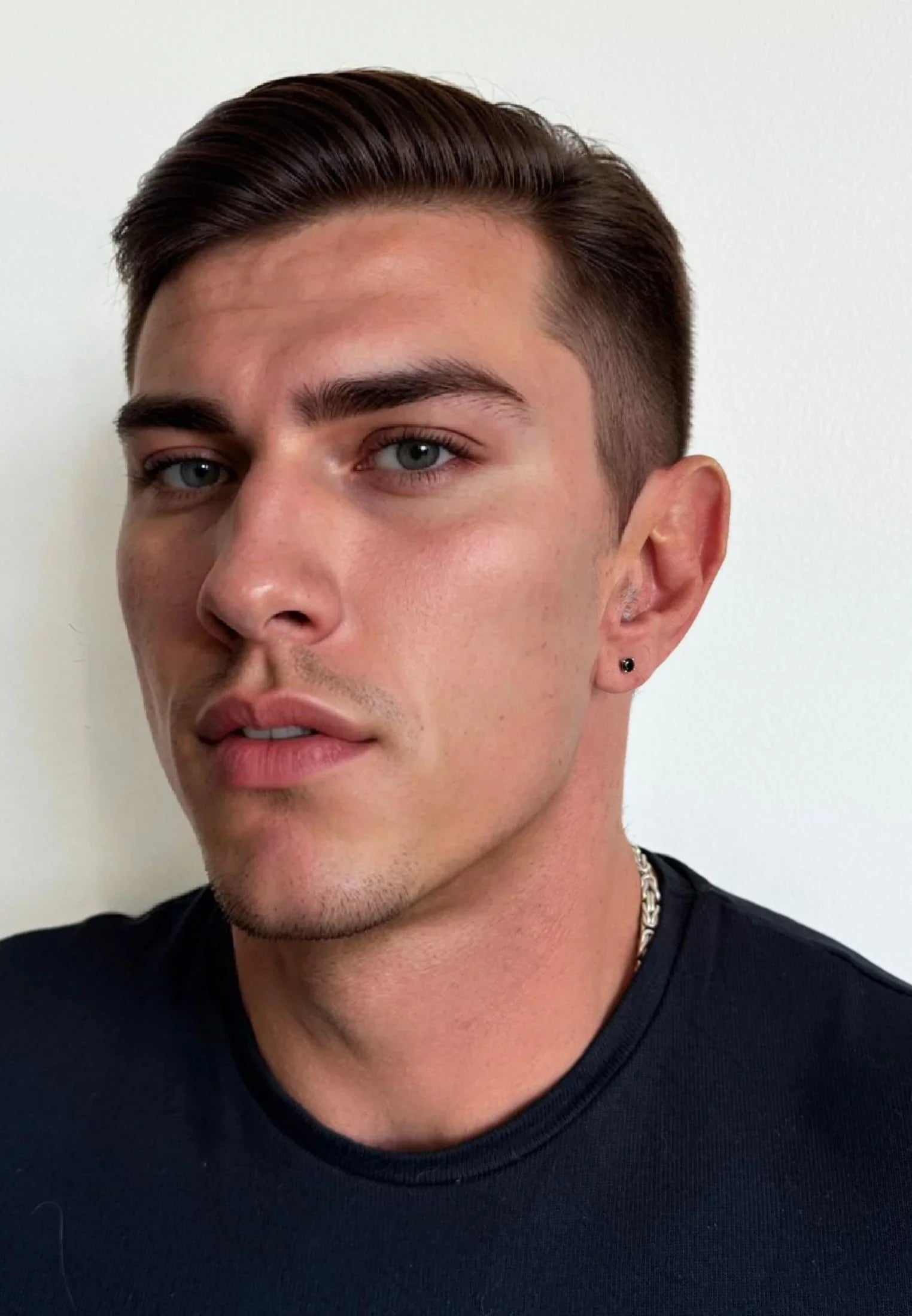 The earring worn by a model.