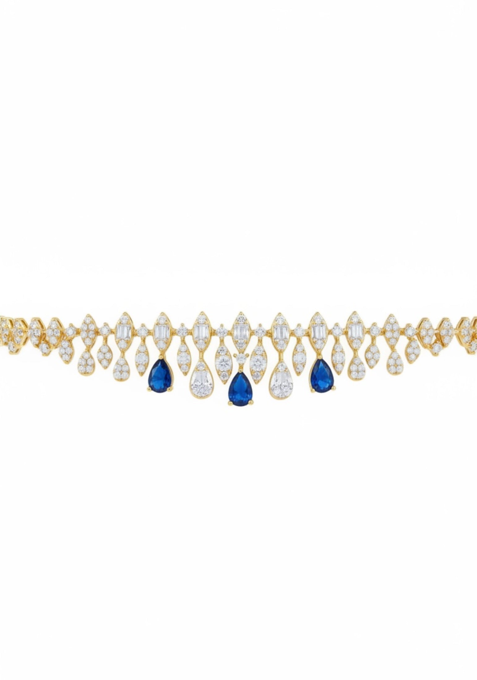 Gold necklace with teardrop-shaped blue and clear gemstones on a white background