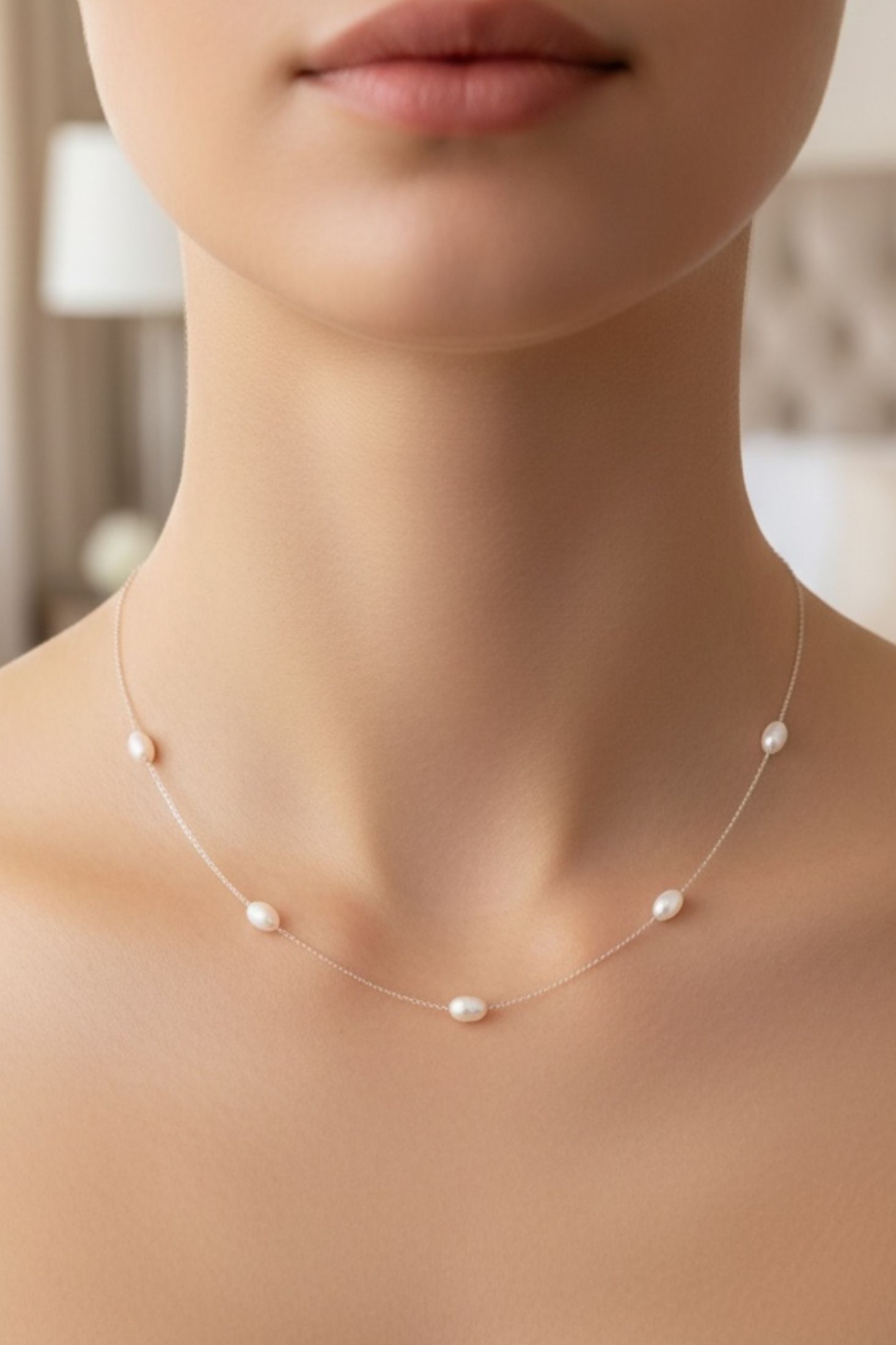 Pearl necklace on a model with a blurred background