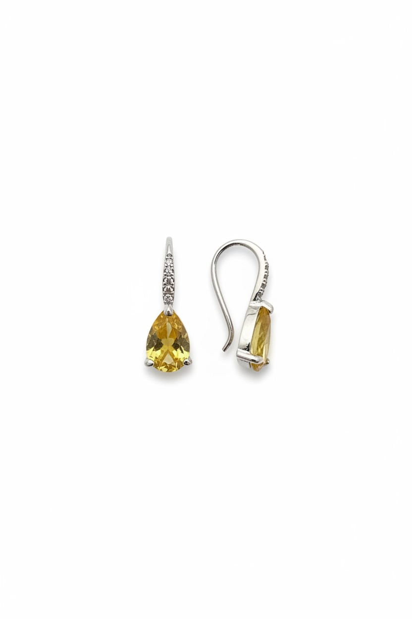 Pair of peridot-cut diamond drop earrings on a white background