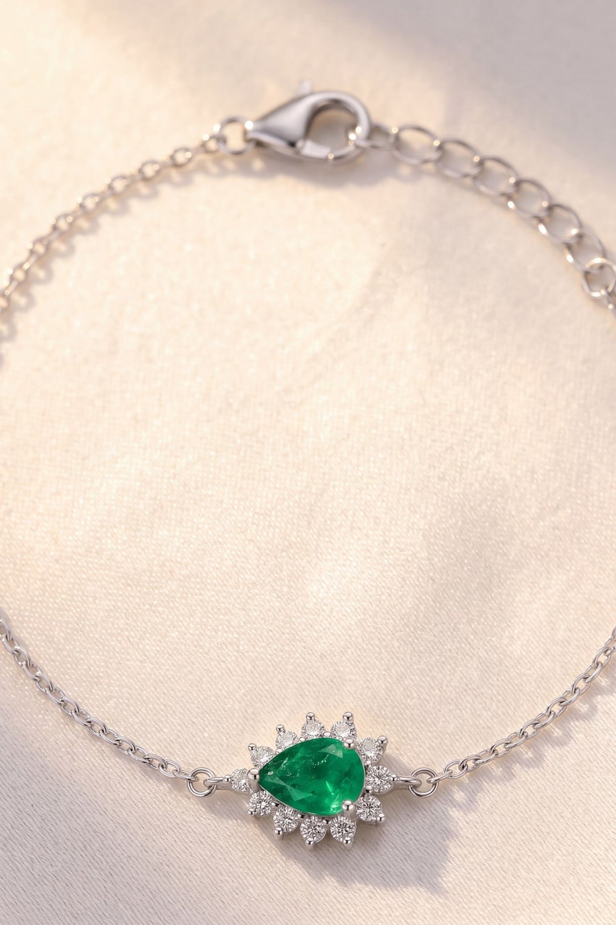 Phillippa Bracelet Emerald Silver worn by a model, showing how it fits on the wrist and its scale.