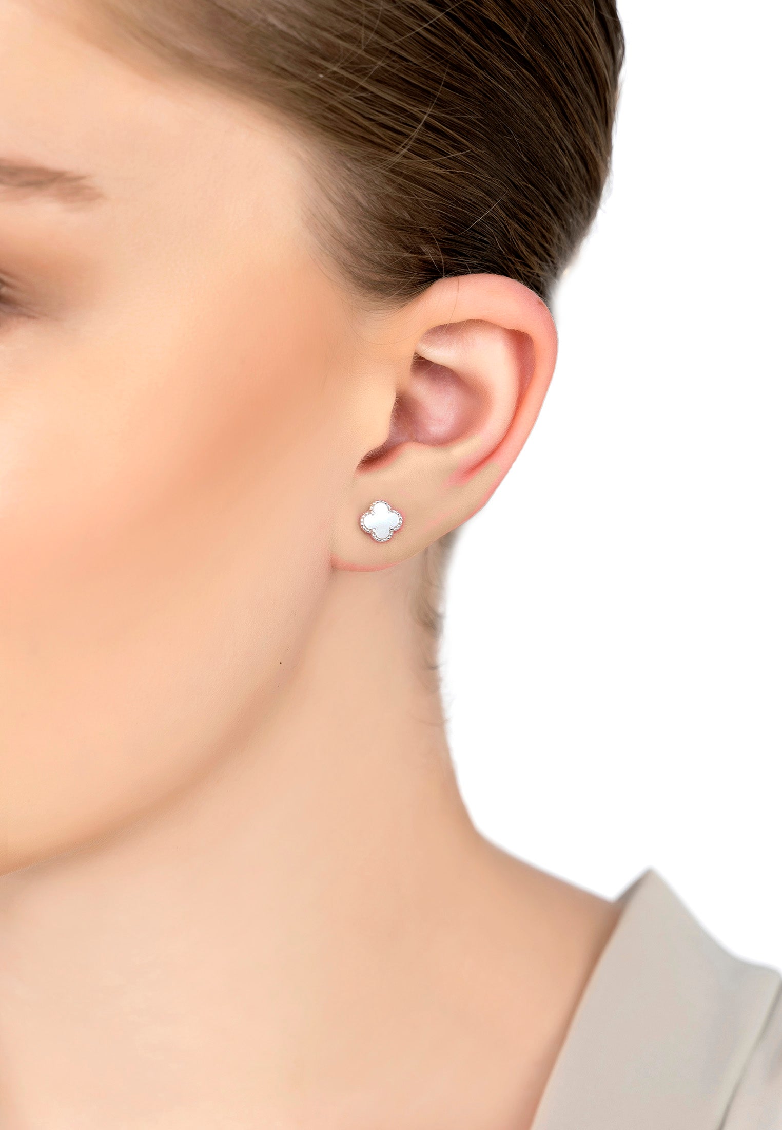 The earring worn by a model.