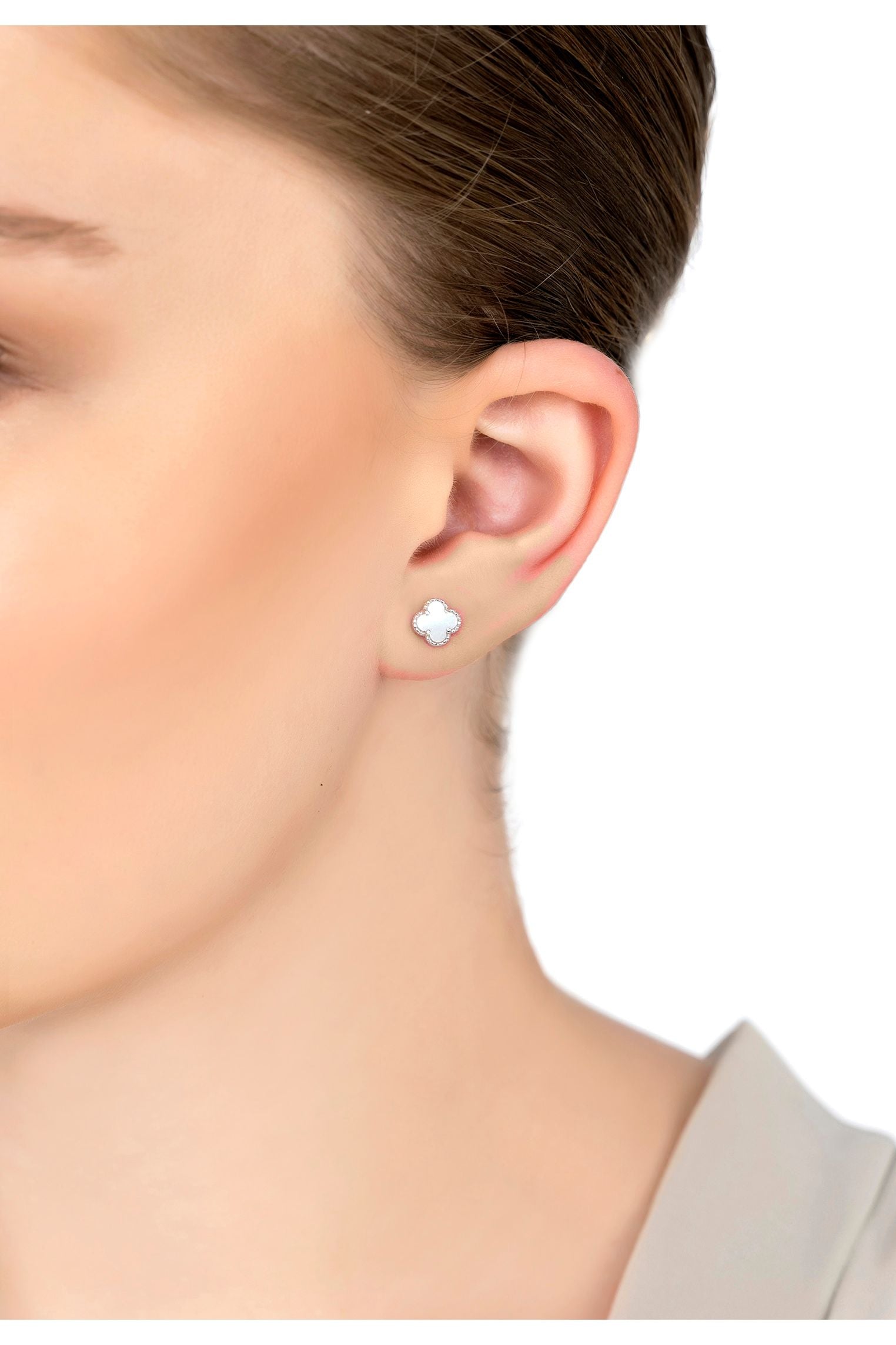The earring worn by a model.