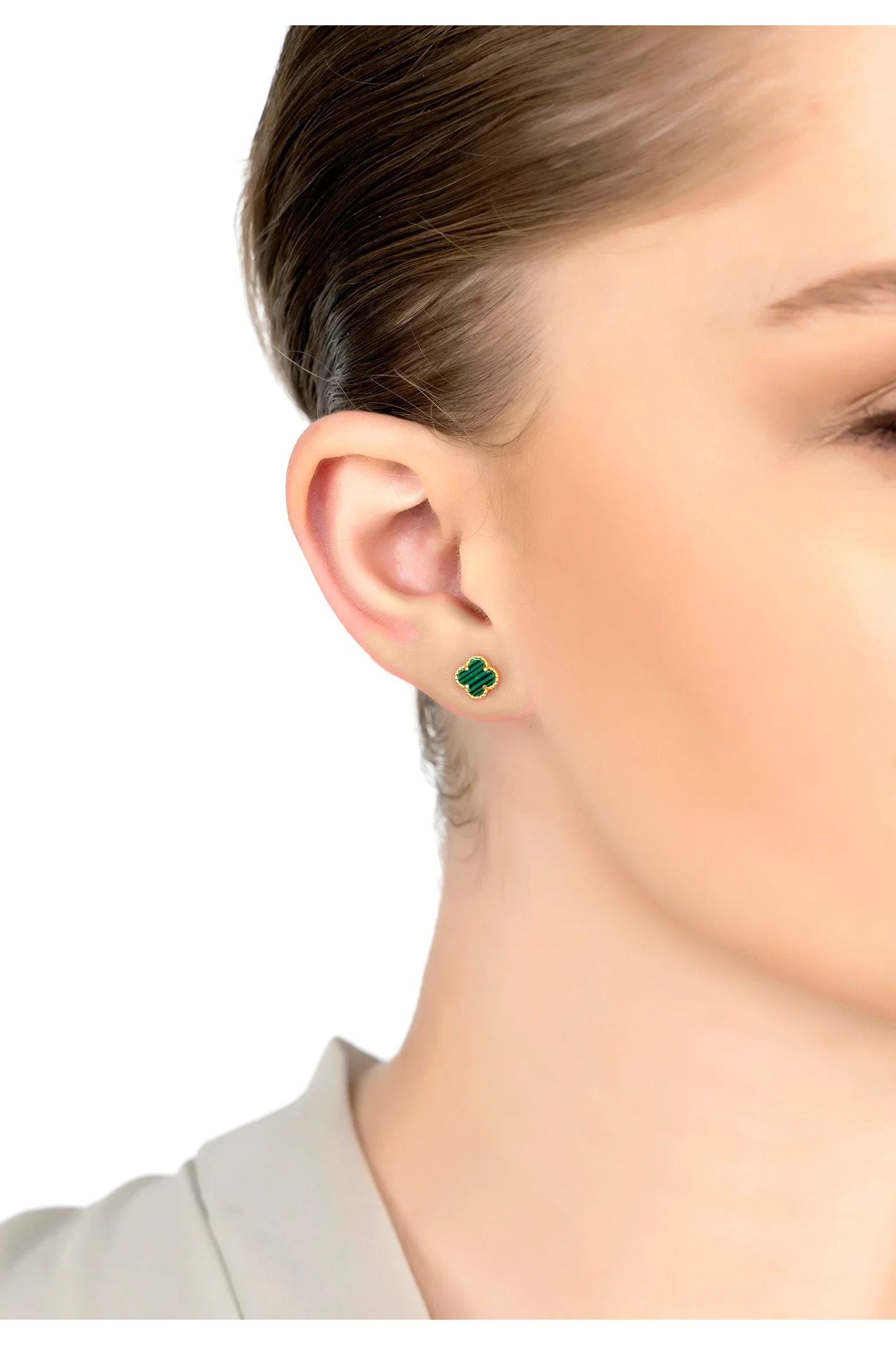 The earring worn by a model.