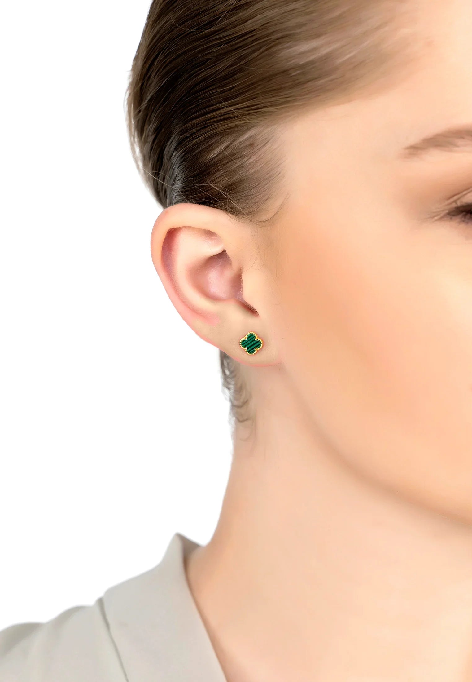 The earring worn by a model.