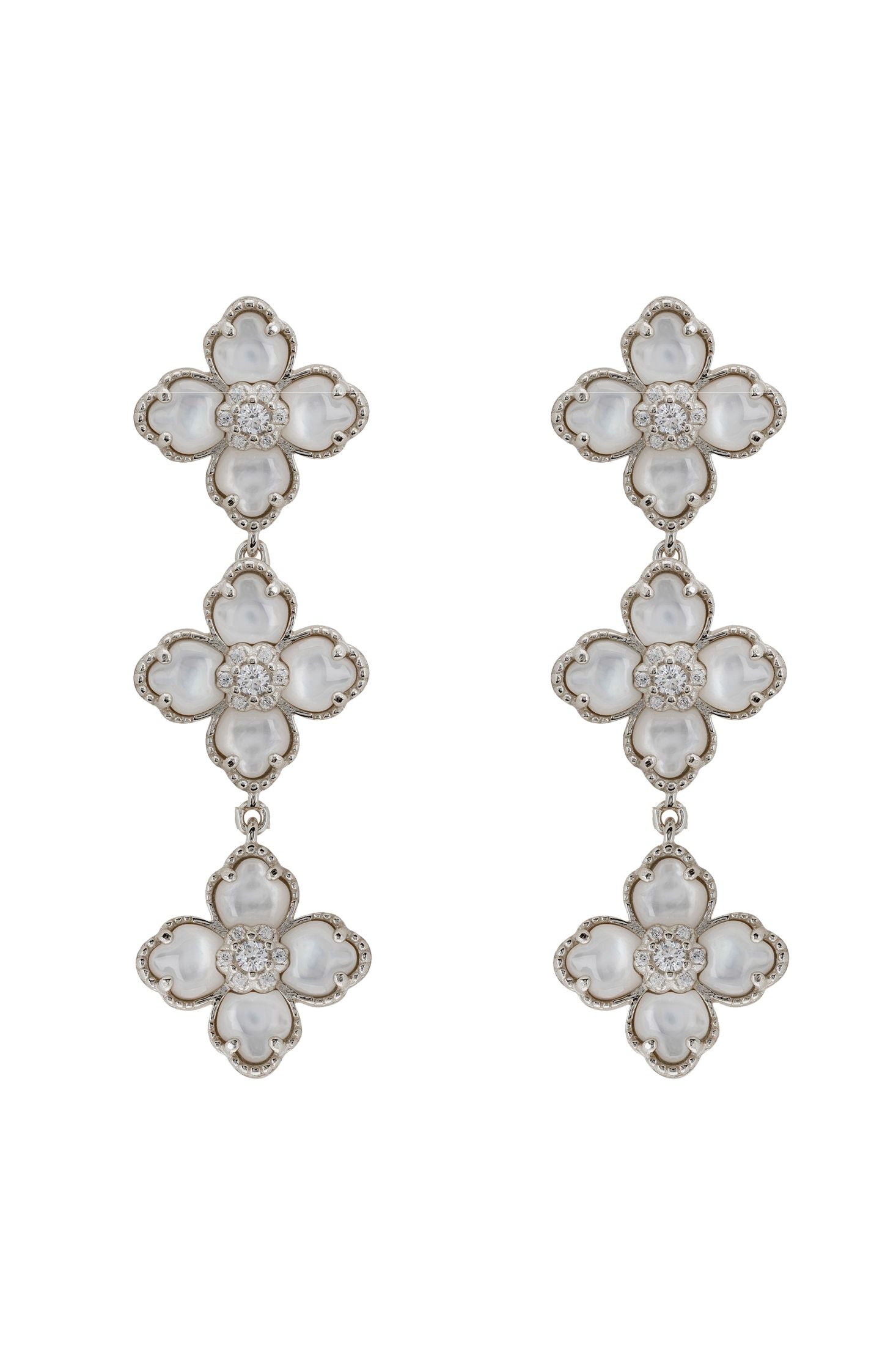 Floral earrings with white stones on a white background