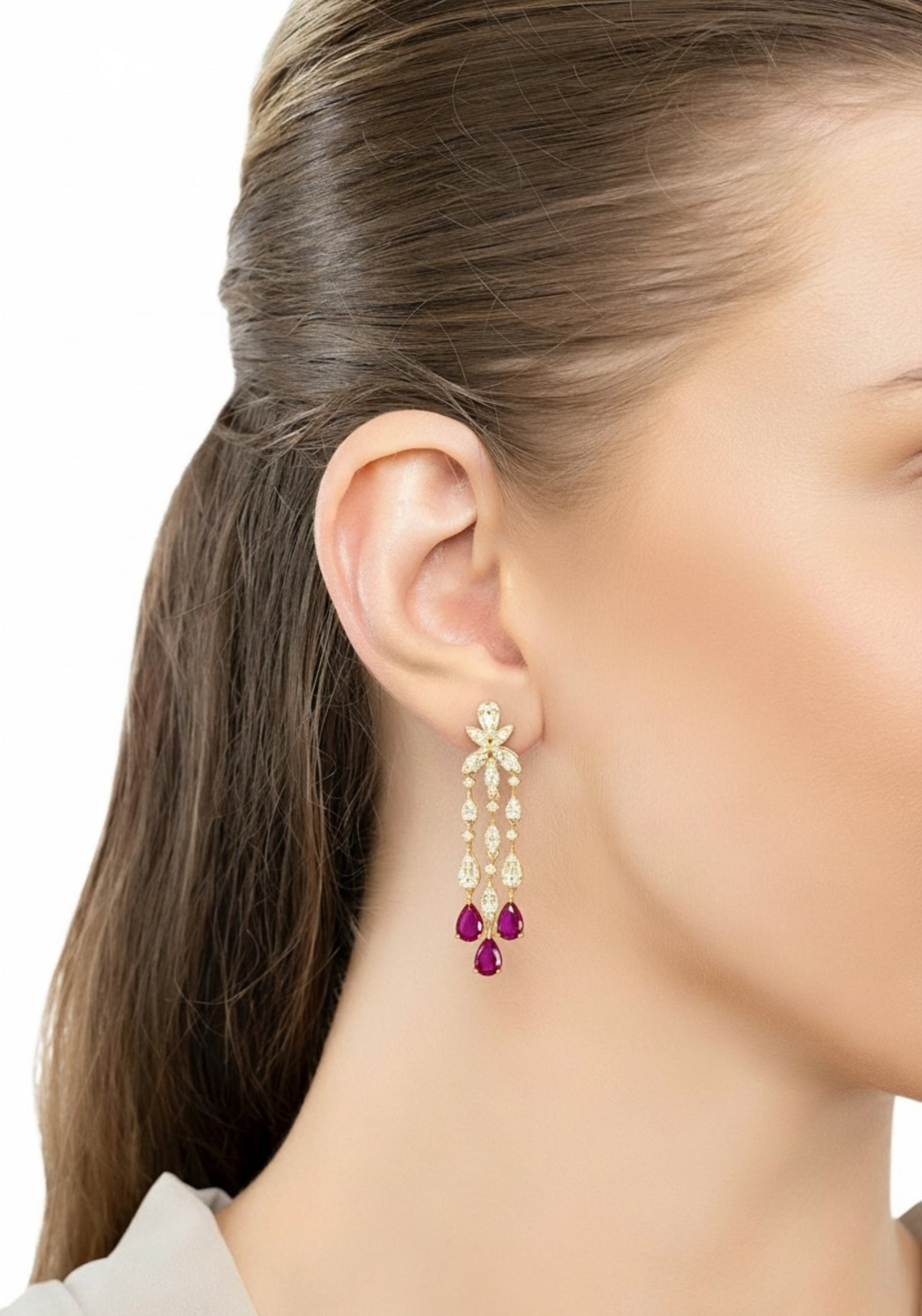 The earring worn by a model.