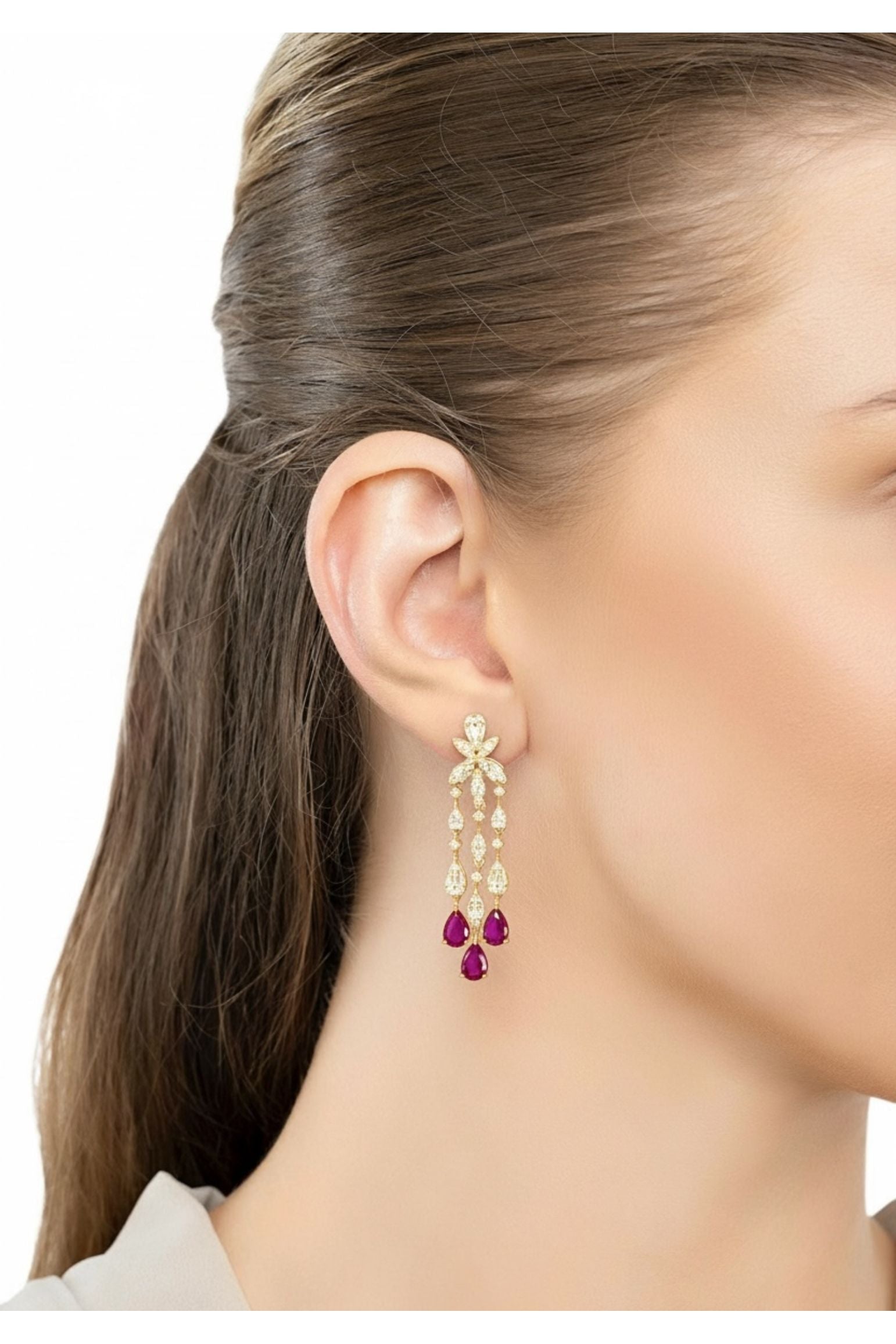 The earring worn by a model.