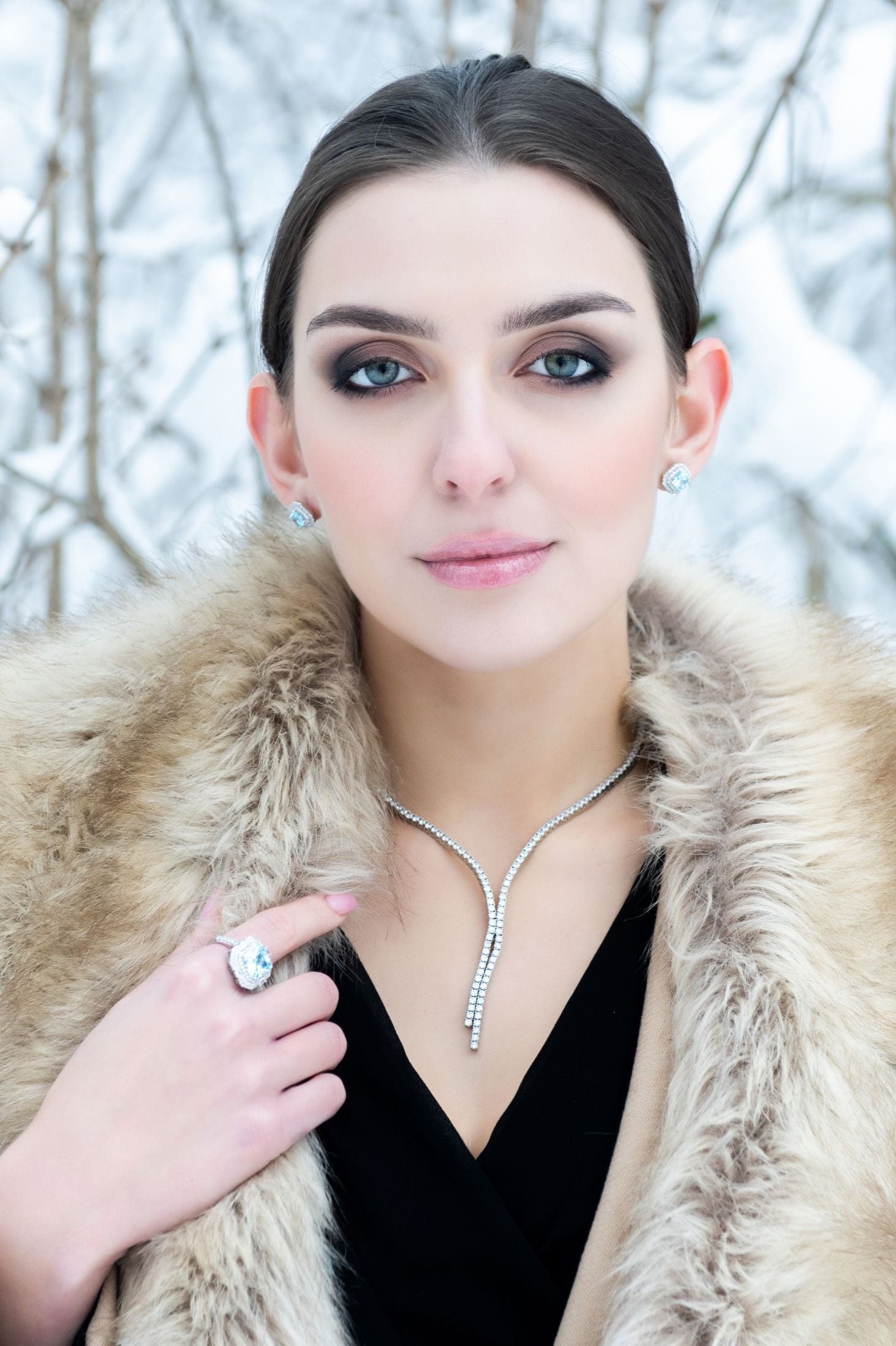 Diamond jewelry worn by a model.