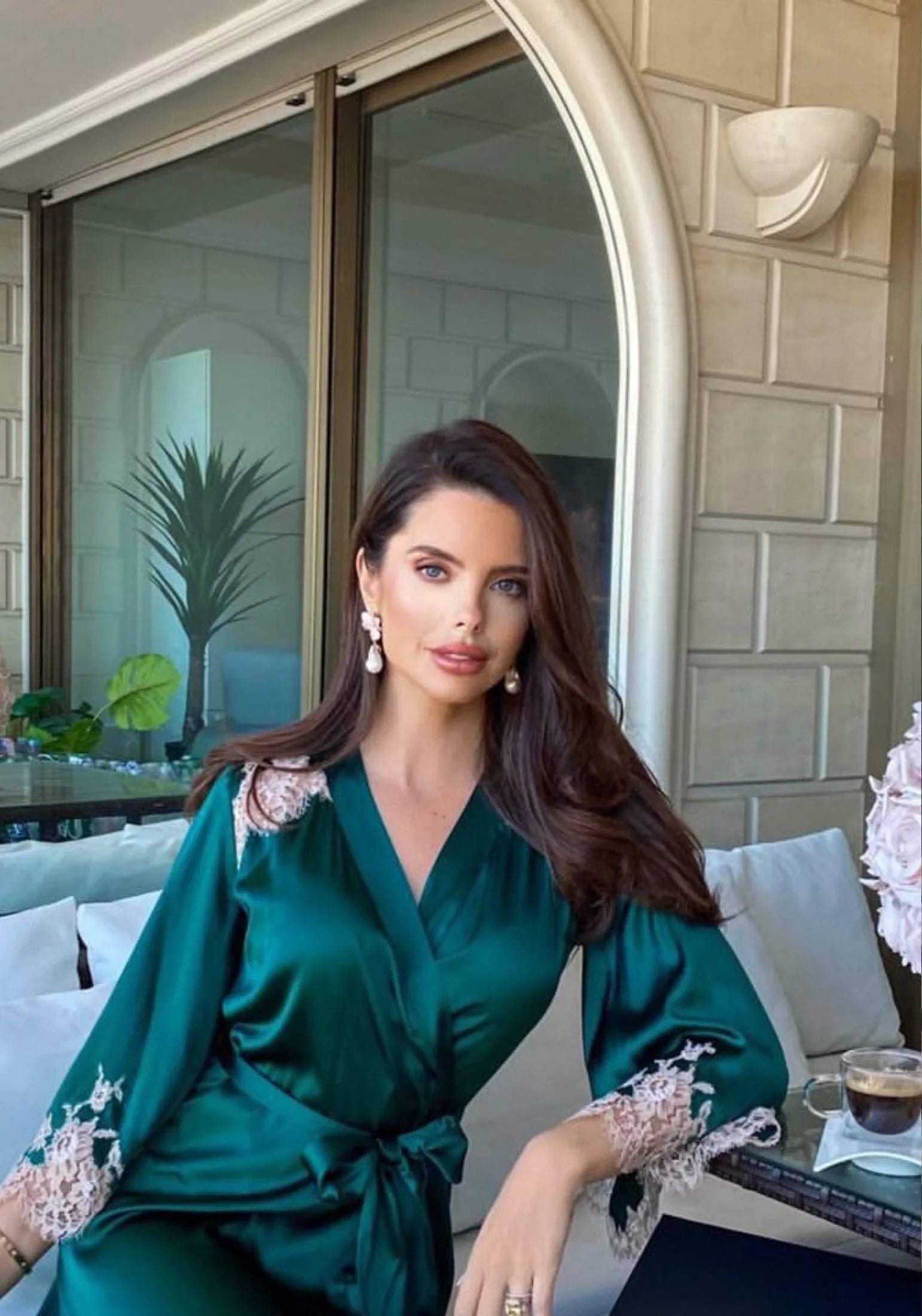 The earring worn by a model.