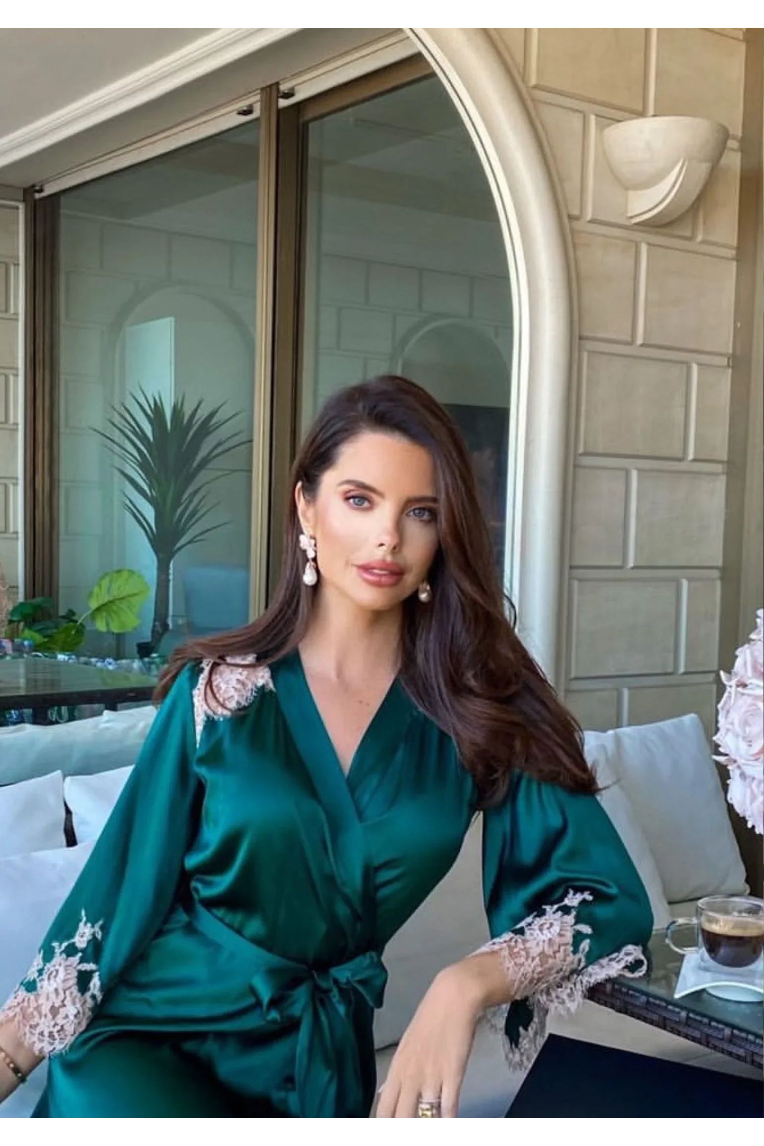 The earring worn by a model.