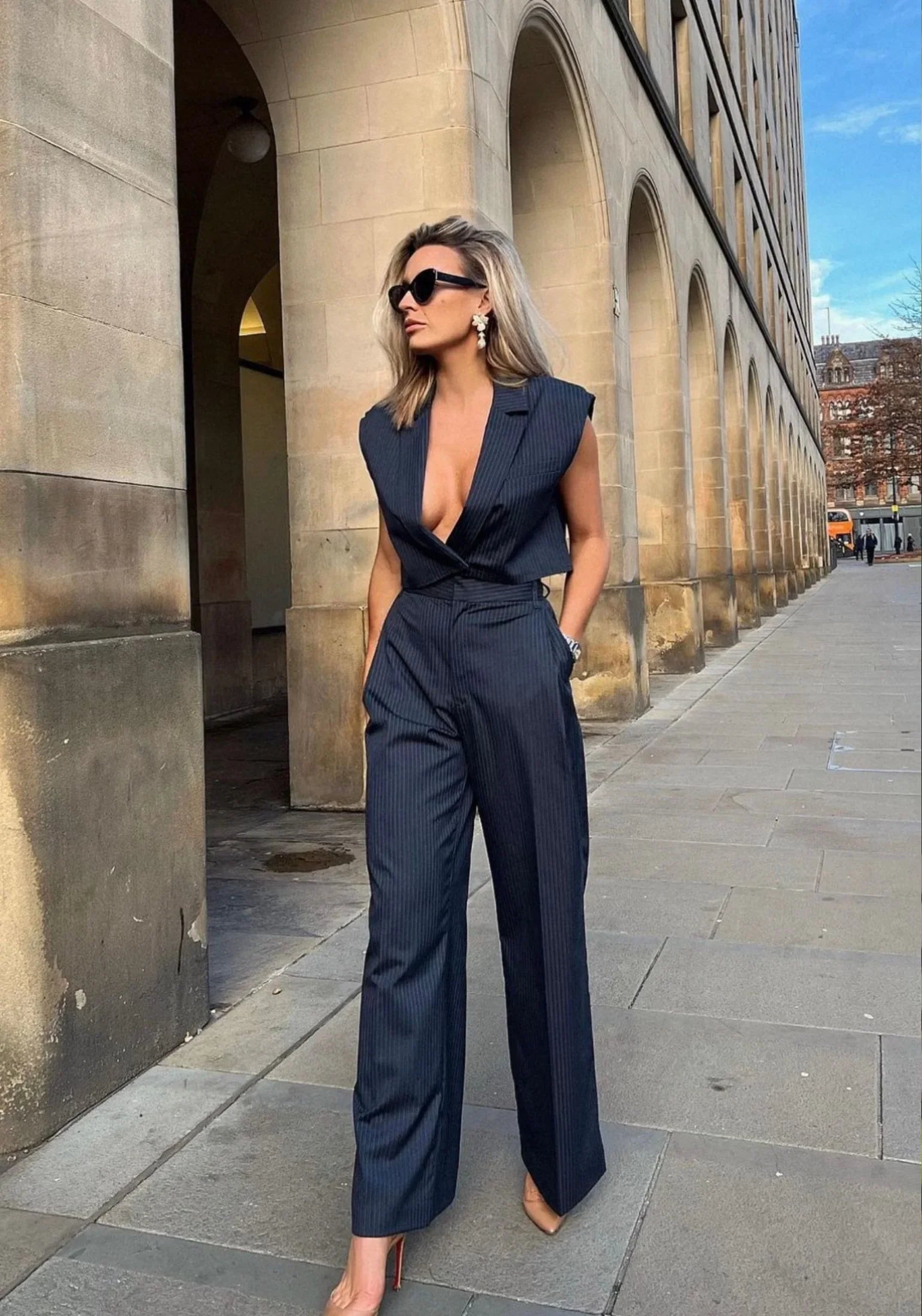 The earring worn by a model.