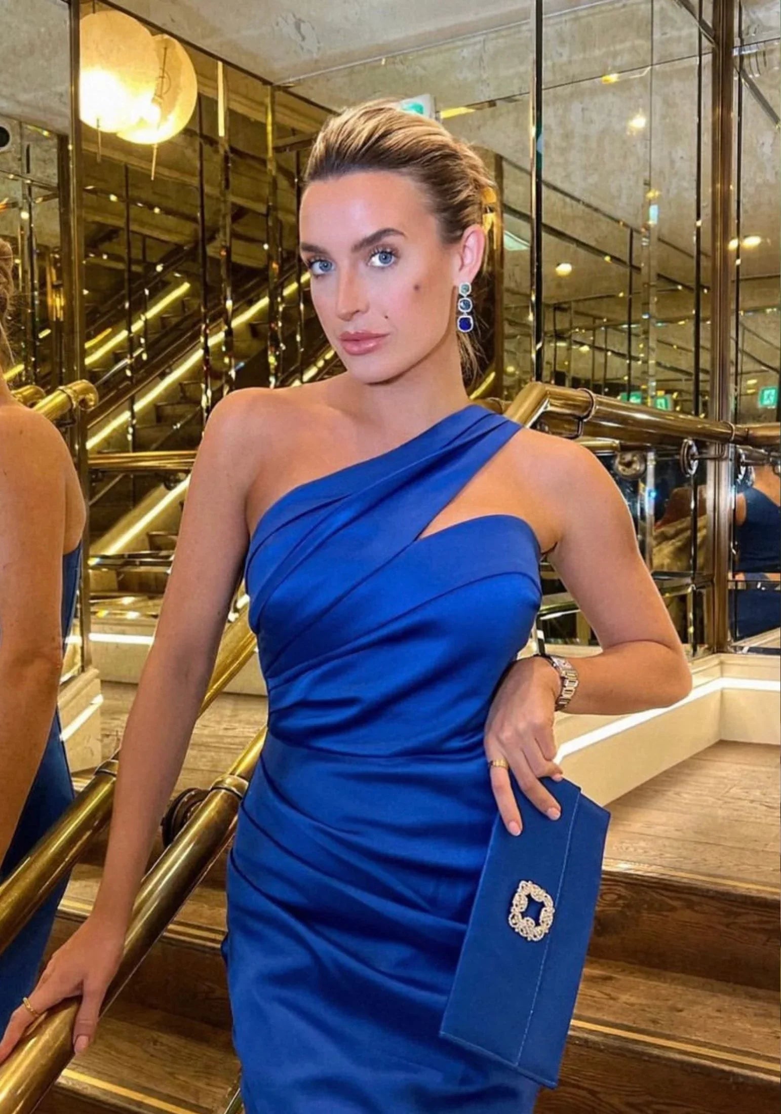 The earring worn by a model.