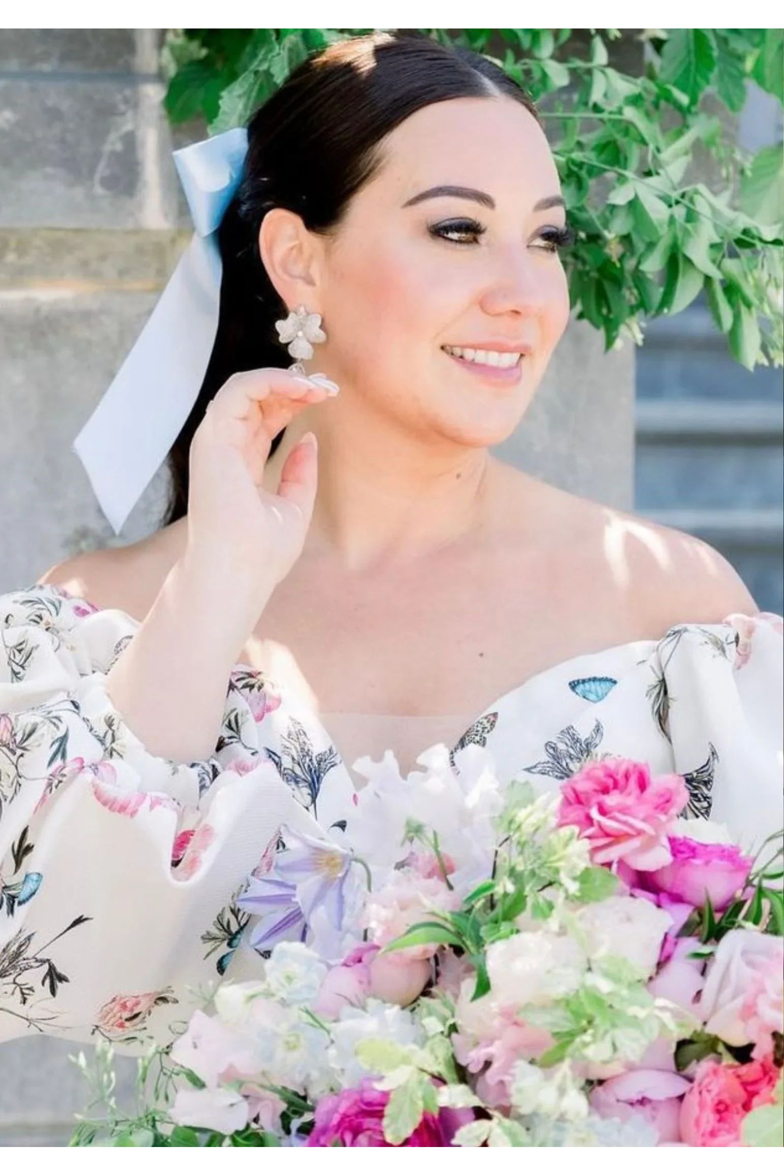 The earring worn by a model.