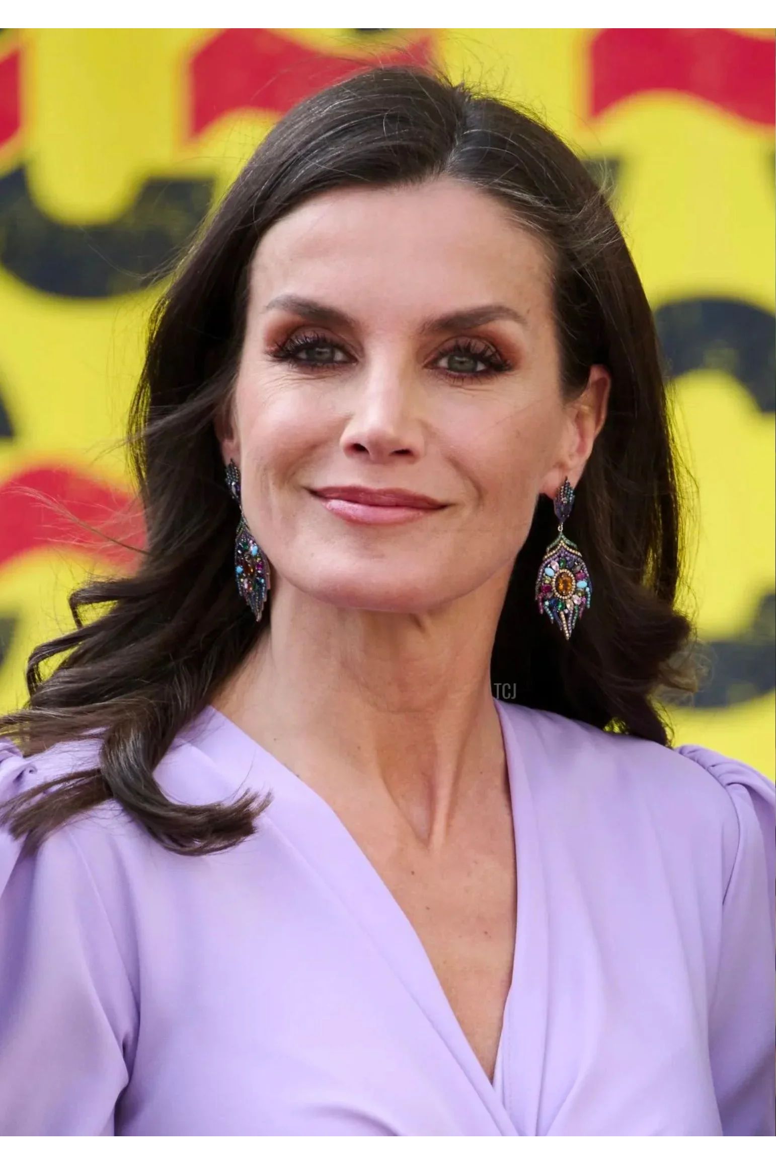 The earrings worn by a model.