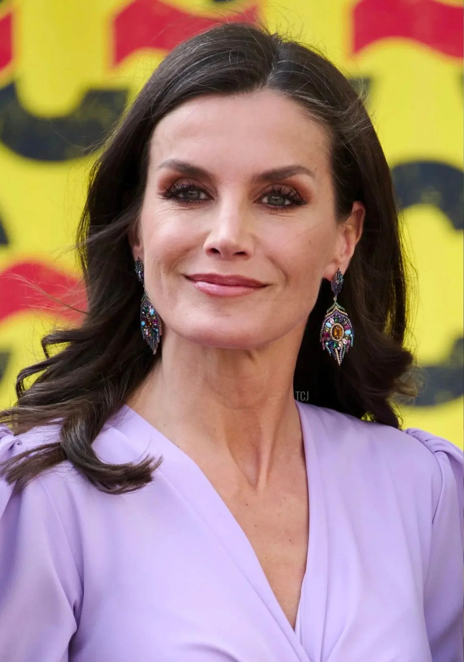 The earrings worn by a model.