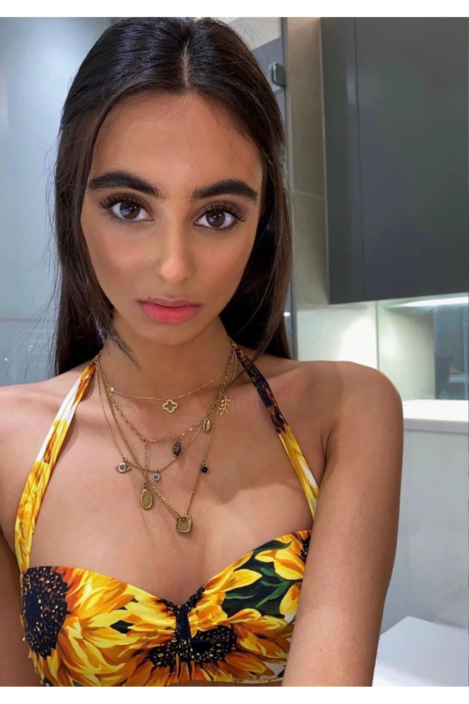 The necklace worn by a model.