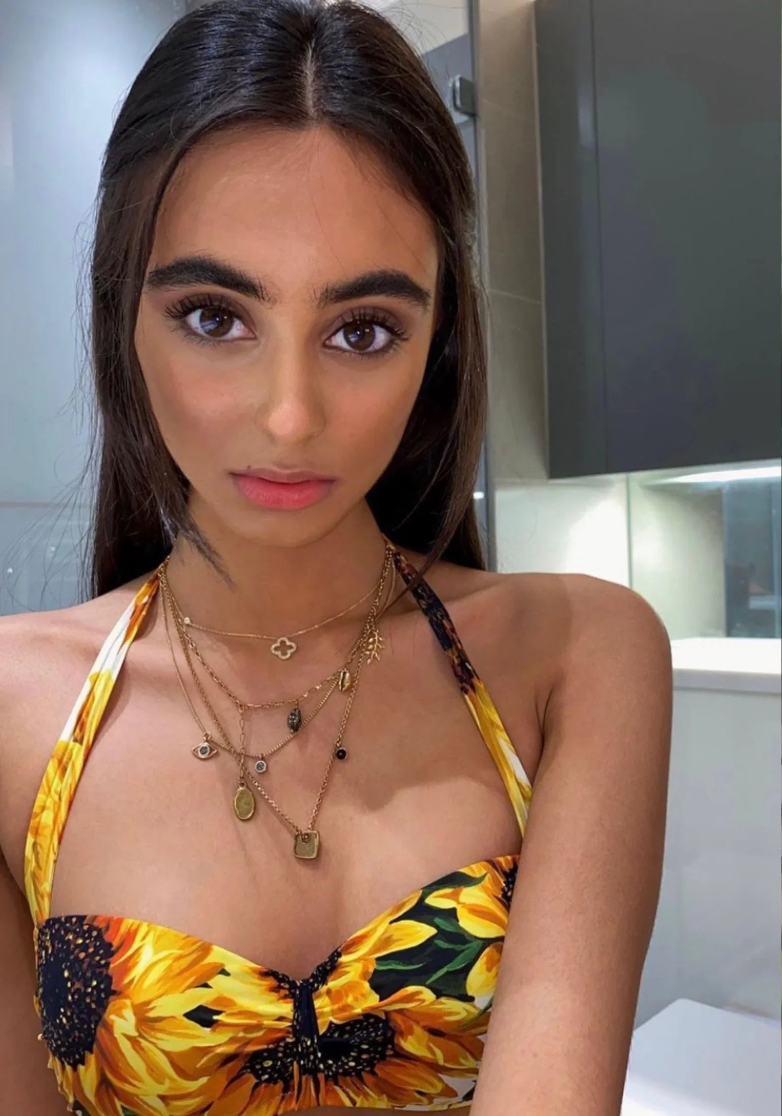 The necklace worn by a model.