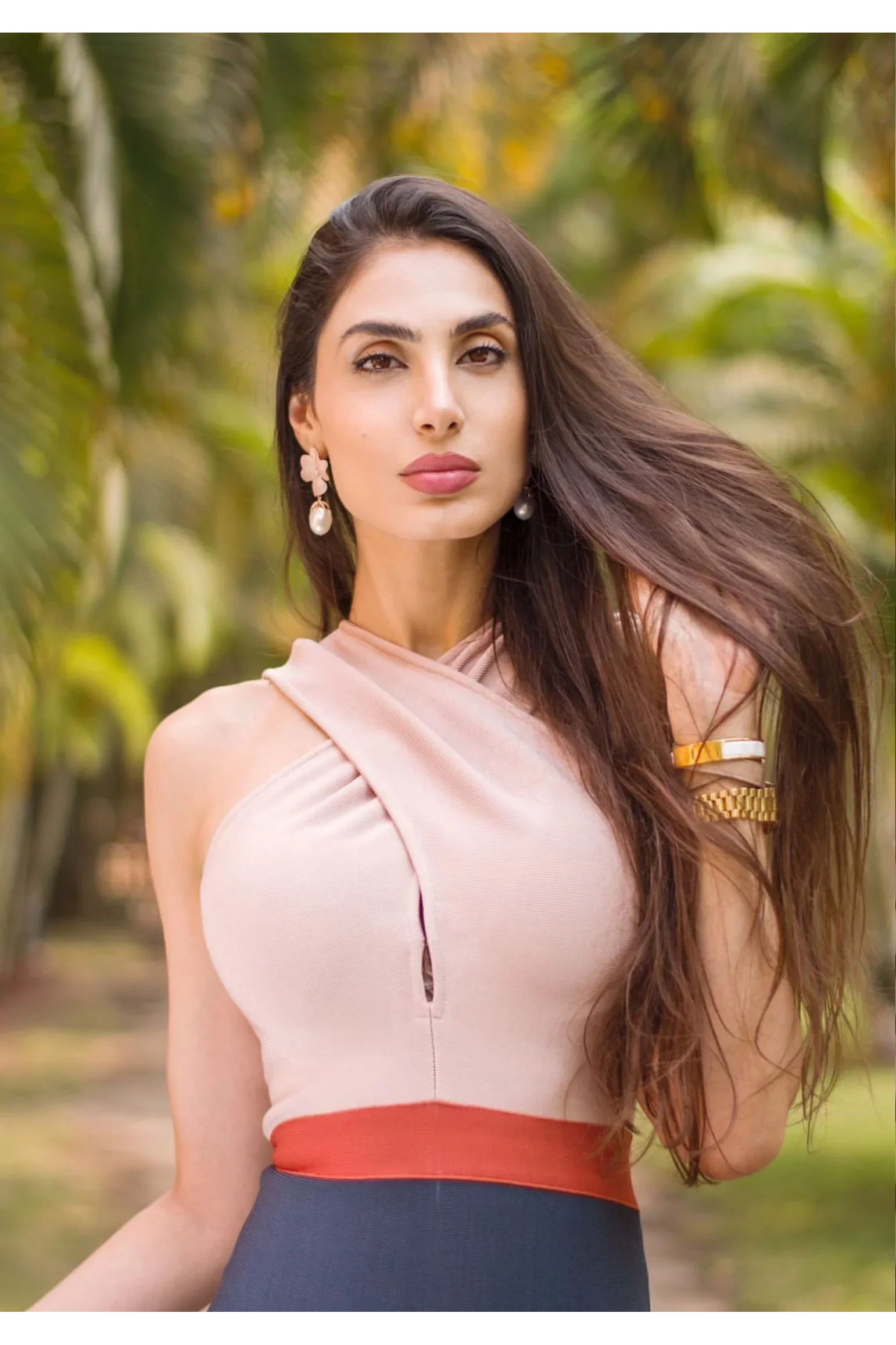 The earring worn by a model.