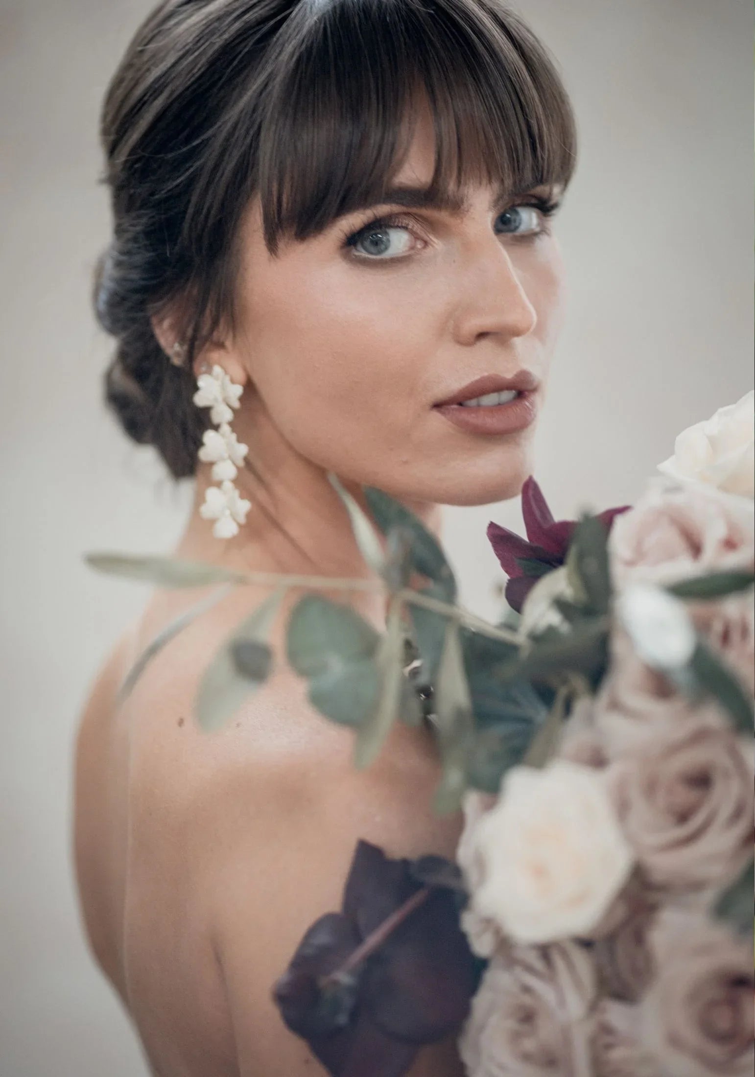 The earring worn by a bride.