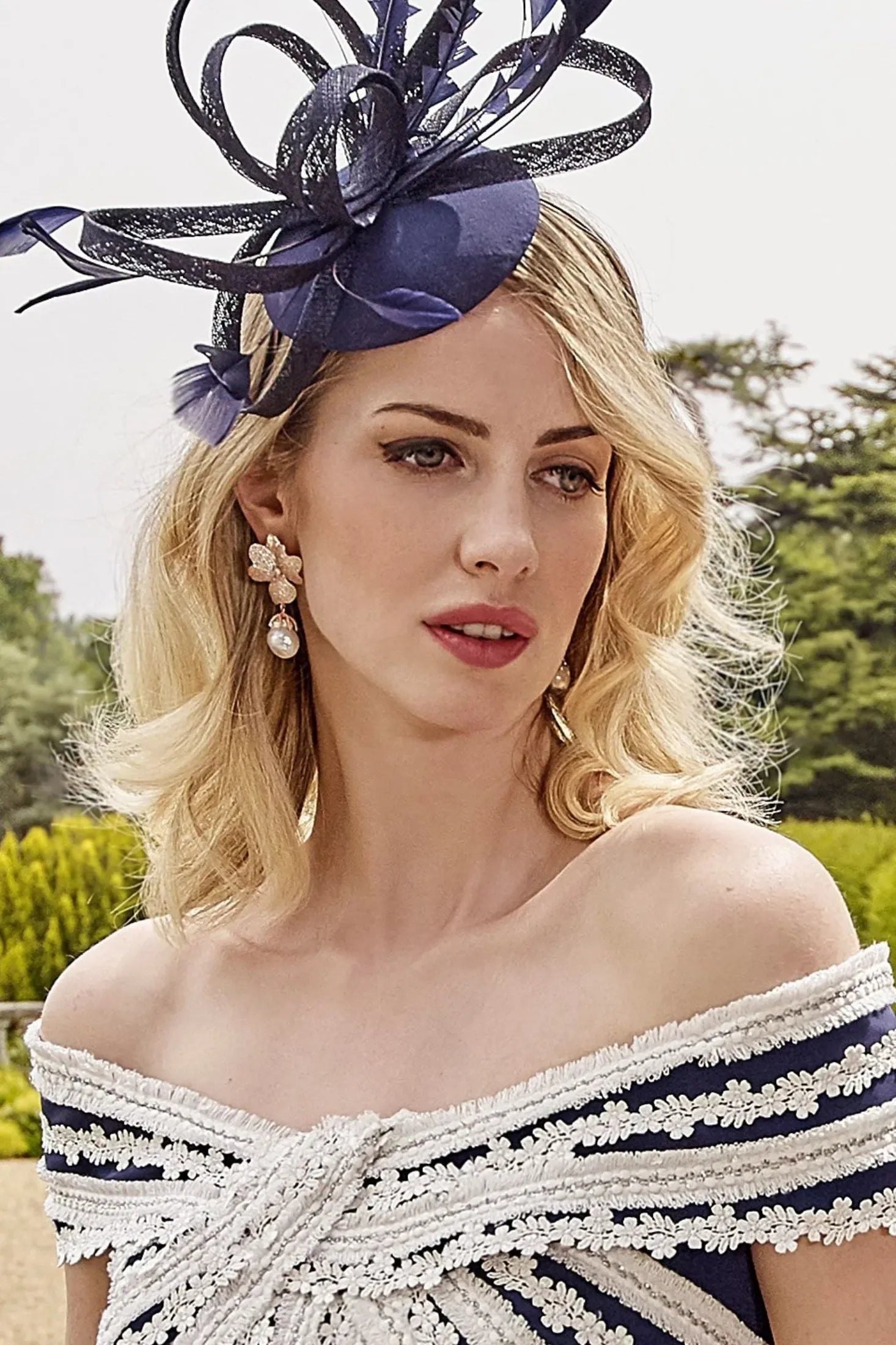 The earrings worn by a model.