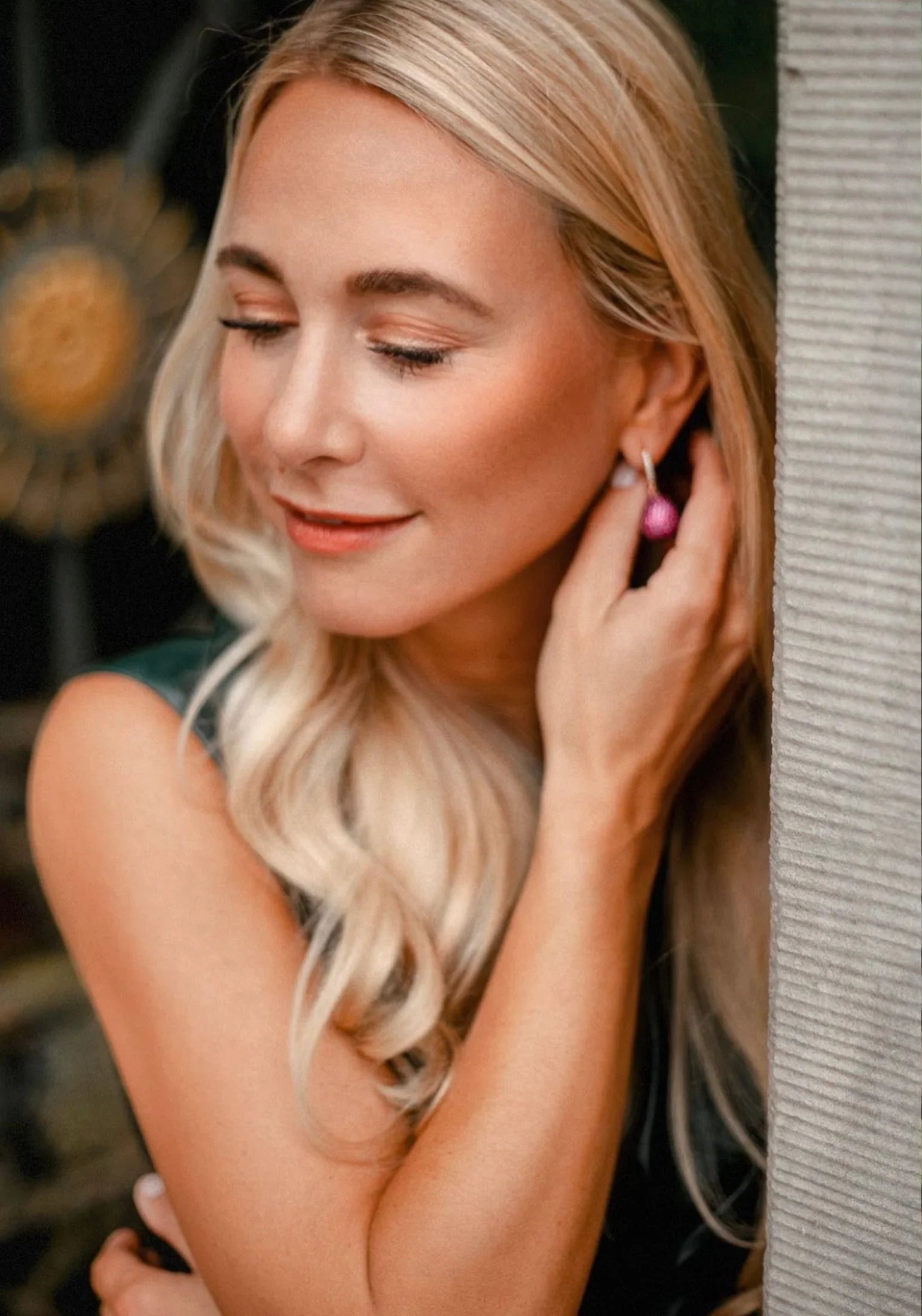 The earring worn by a model.