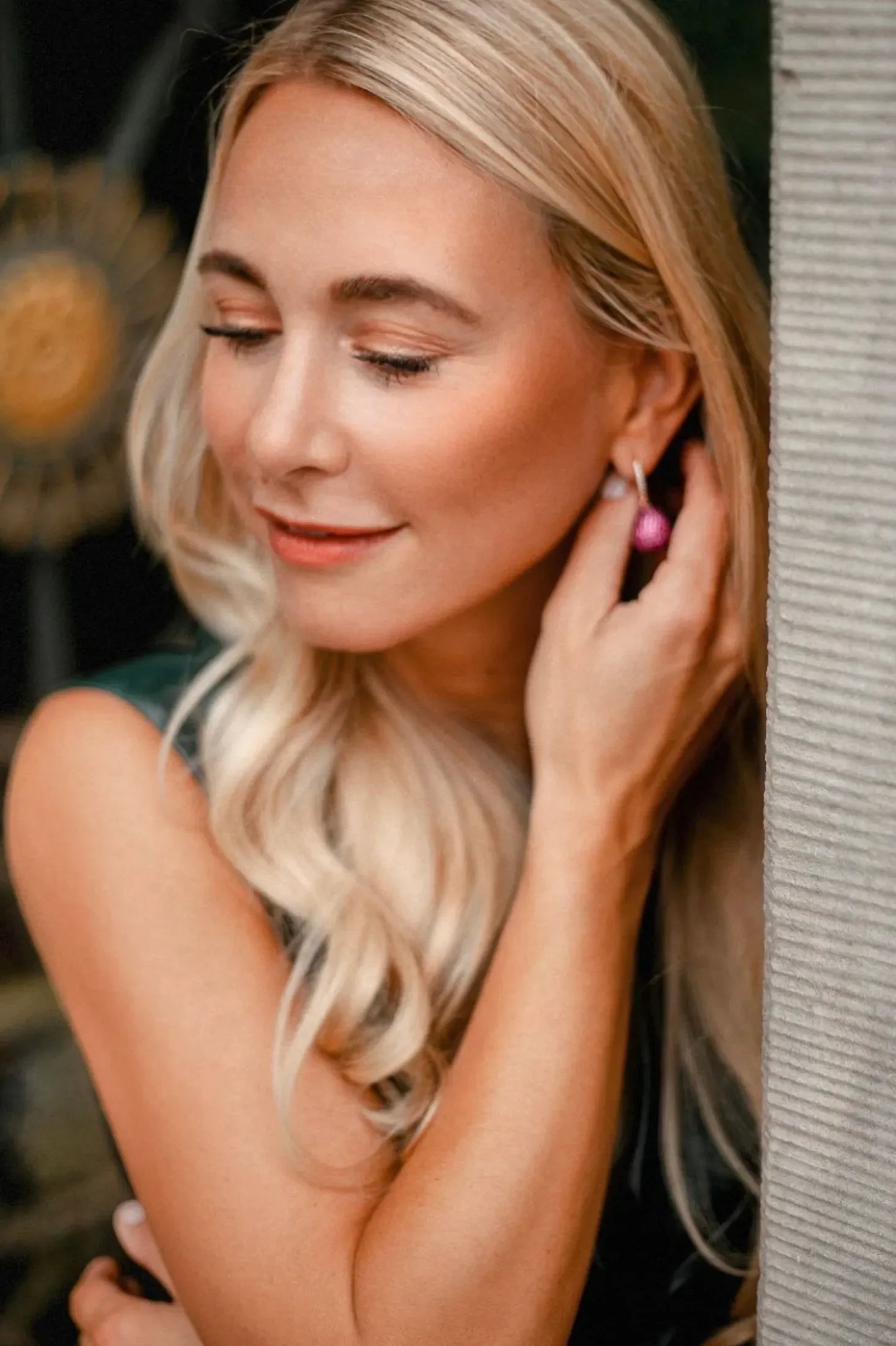 The earring worn by a model.