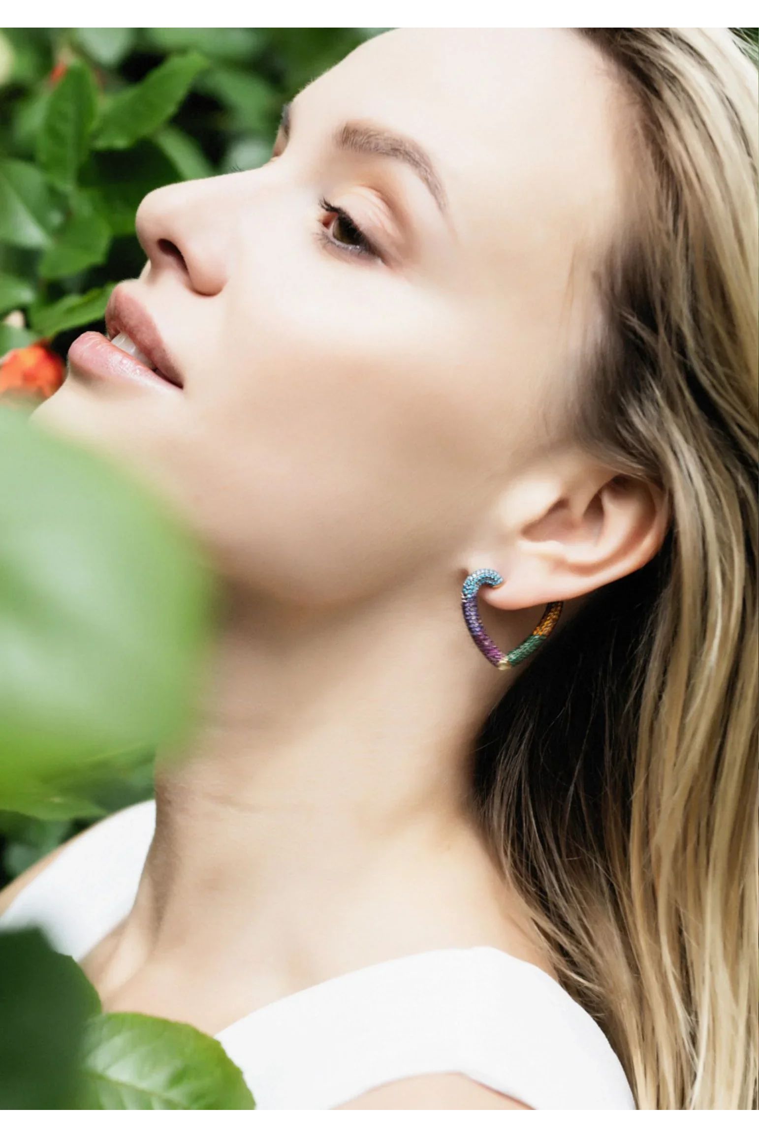 The earring worn by a model.
