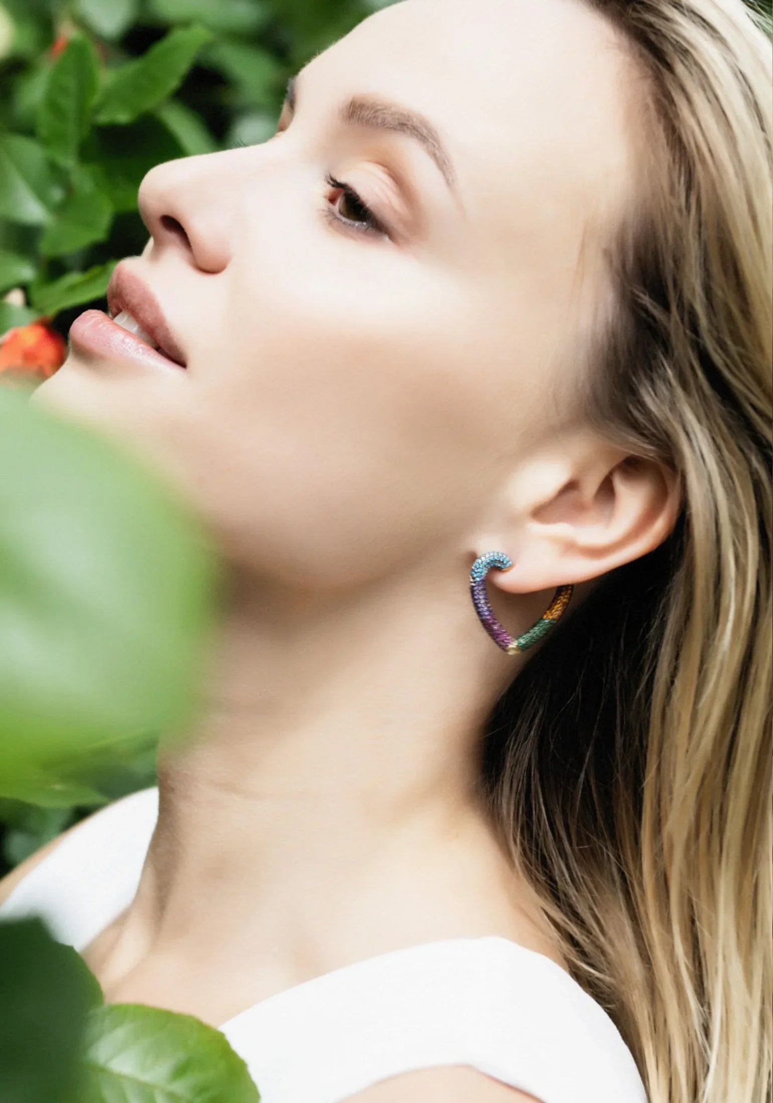 The earring worn by a model.
