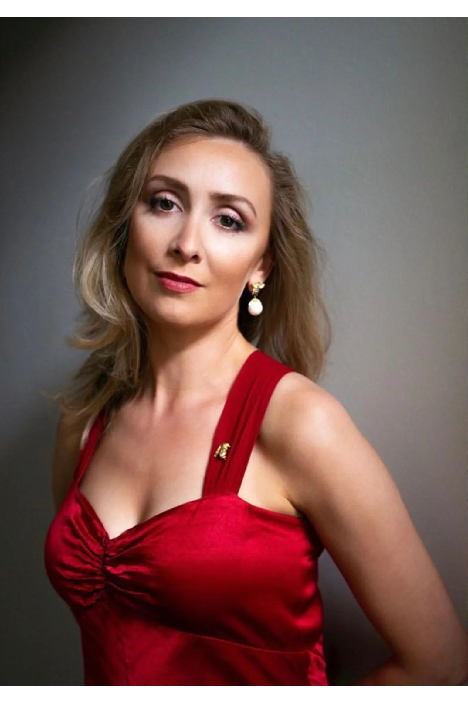 The earring worn by a model.