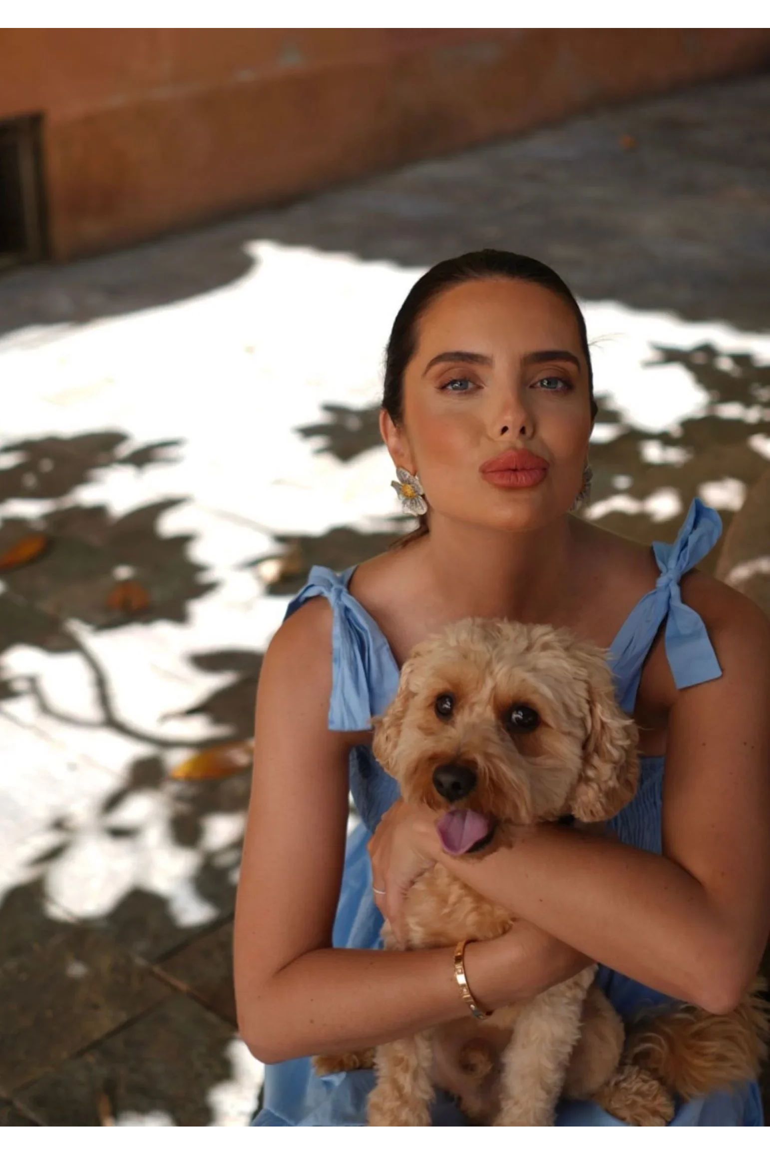 The earring worn by a model.